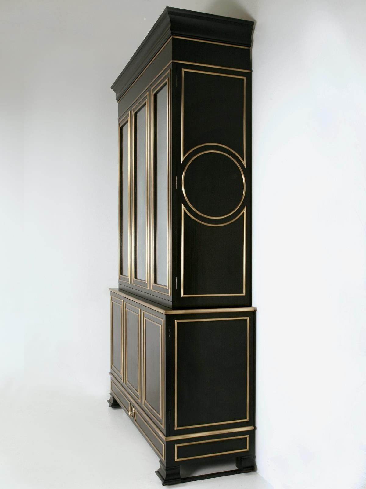 Maison Jansen inspired Louis XVI style Bookcase or Display Cabinet, that was created in our Old Plank woodworking department. This beautiful Ebonized Mahogany Bookcase, or China Cabinet was a custom creation and constructed to the highest standards,