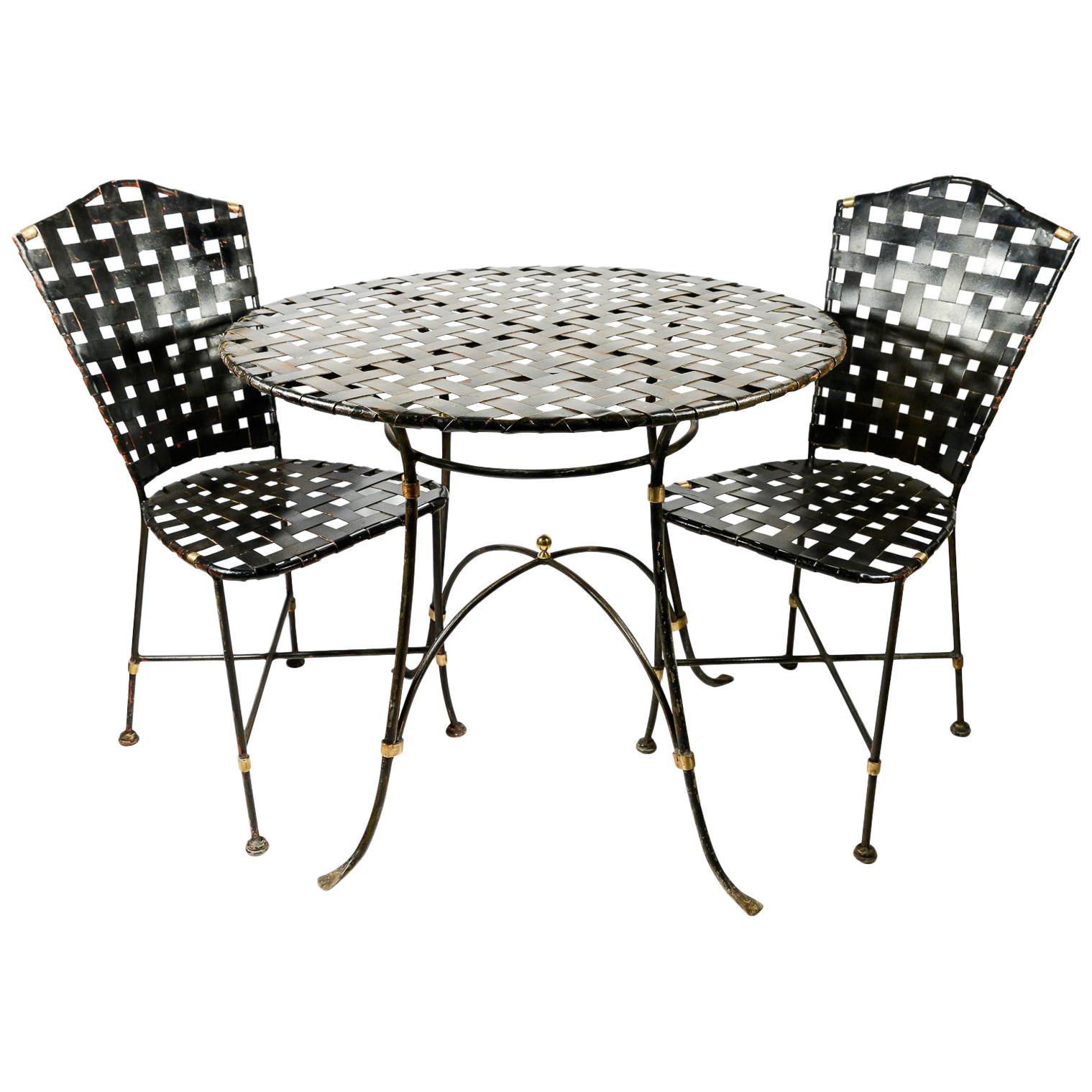 Maison Jansen, Set of two chairs and a table, iron, circa 1970, France For Sale