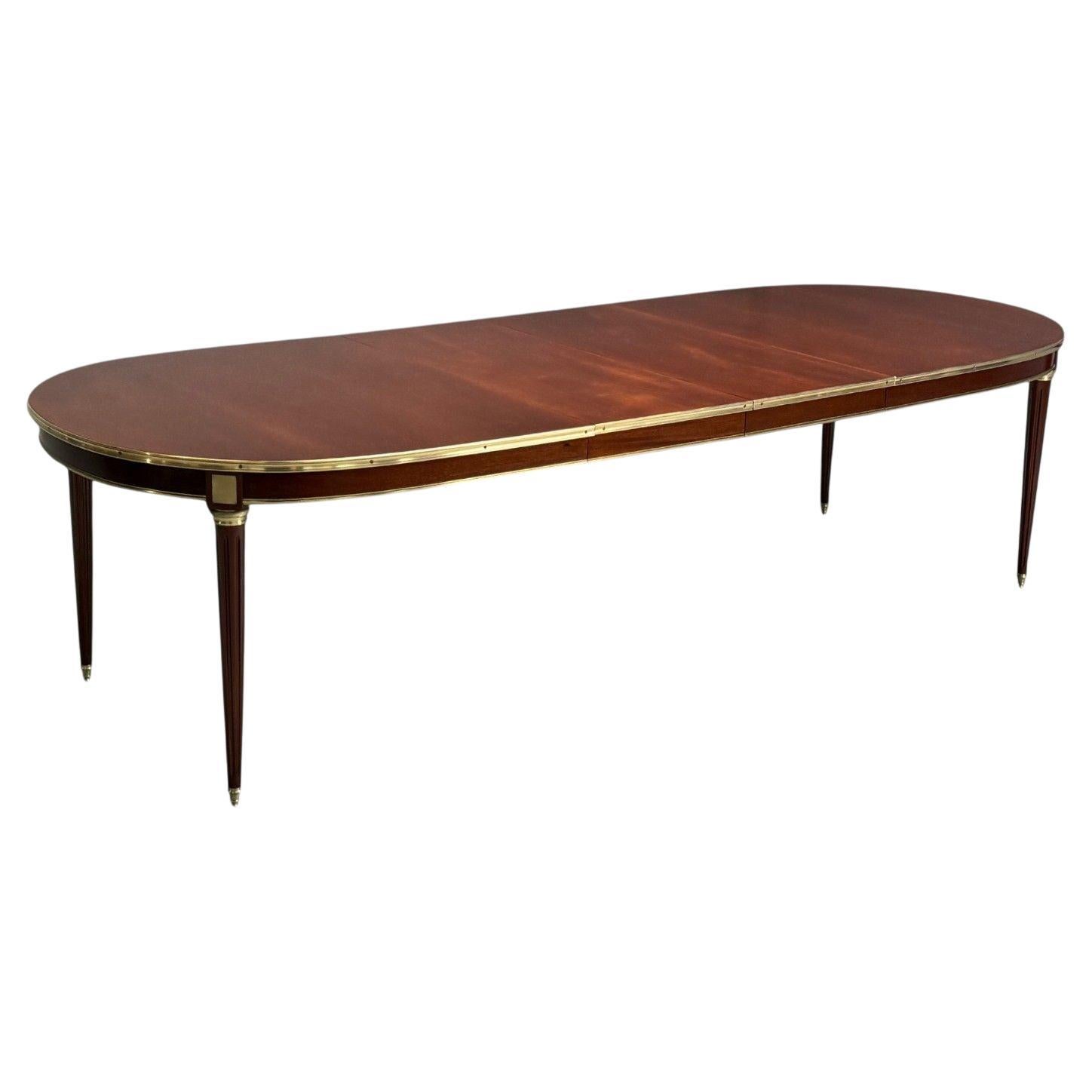 Maison Jansen, style Louis XVI, acajou, bronze, table de salle à manger, France, années 1920