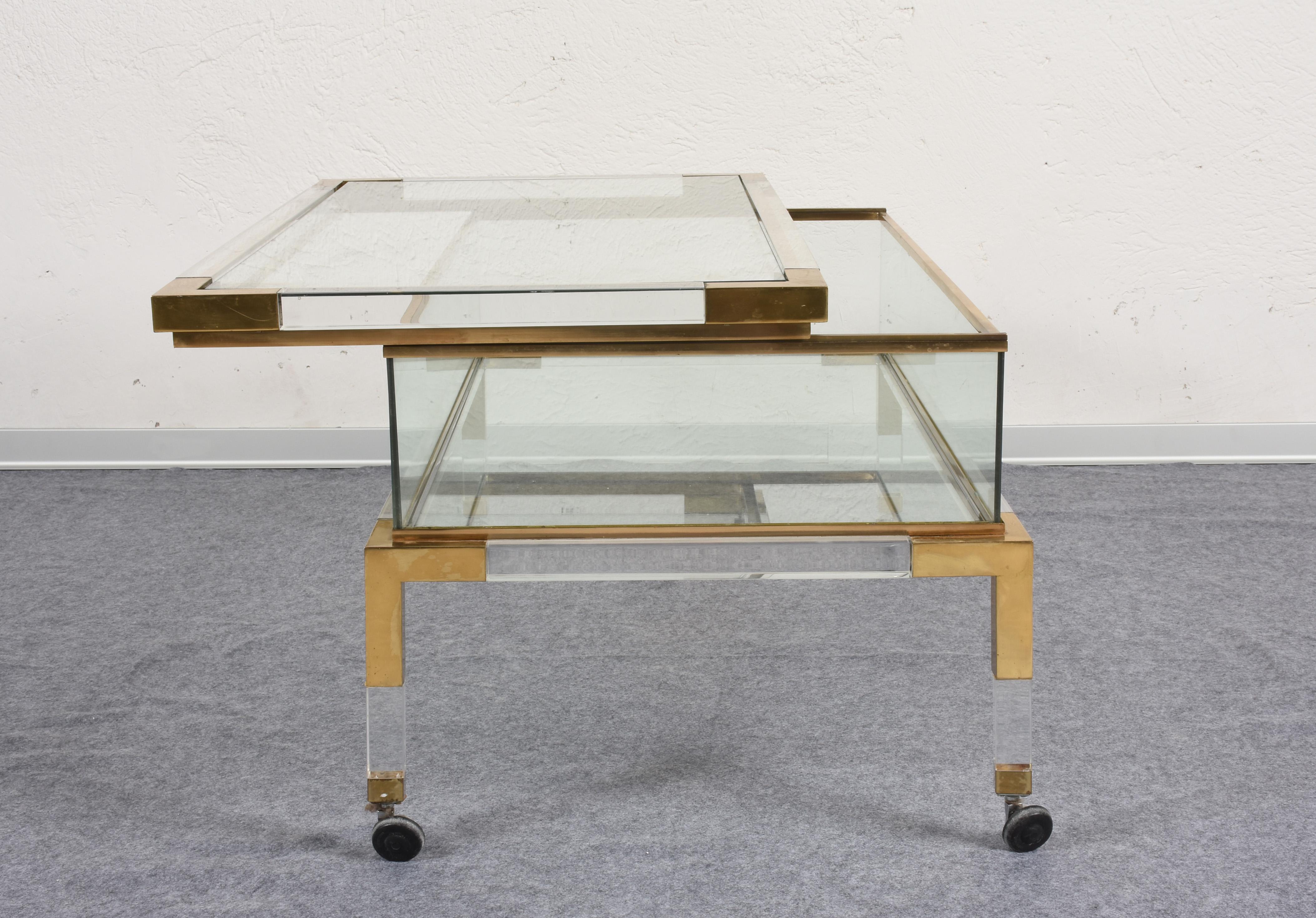 Late 20th Century Maison Jansen Lucite and Brass French Coffee Table with Sliding Shelf, 1970s