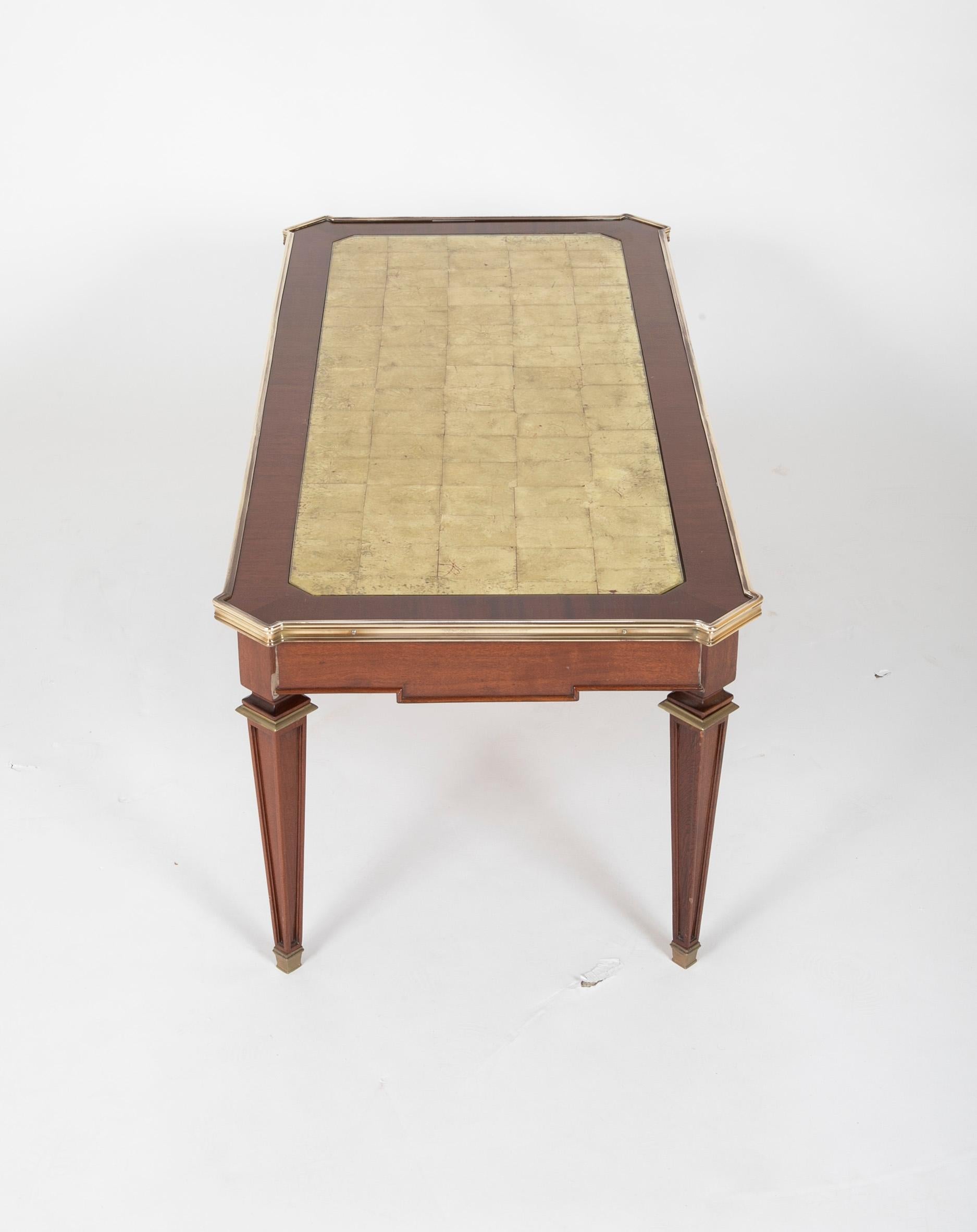 Maison Jansen Mahogany Coffee Table with Gold Leaf Glass Top and Bronze Mounts In Good Condition In Stamford, CT