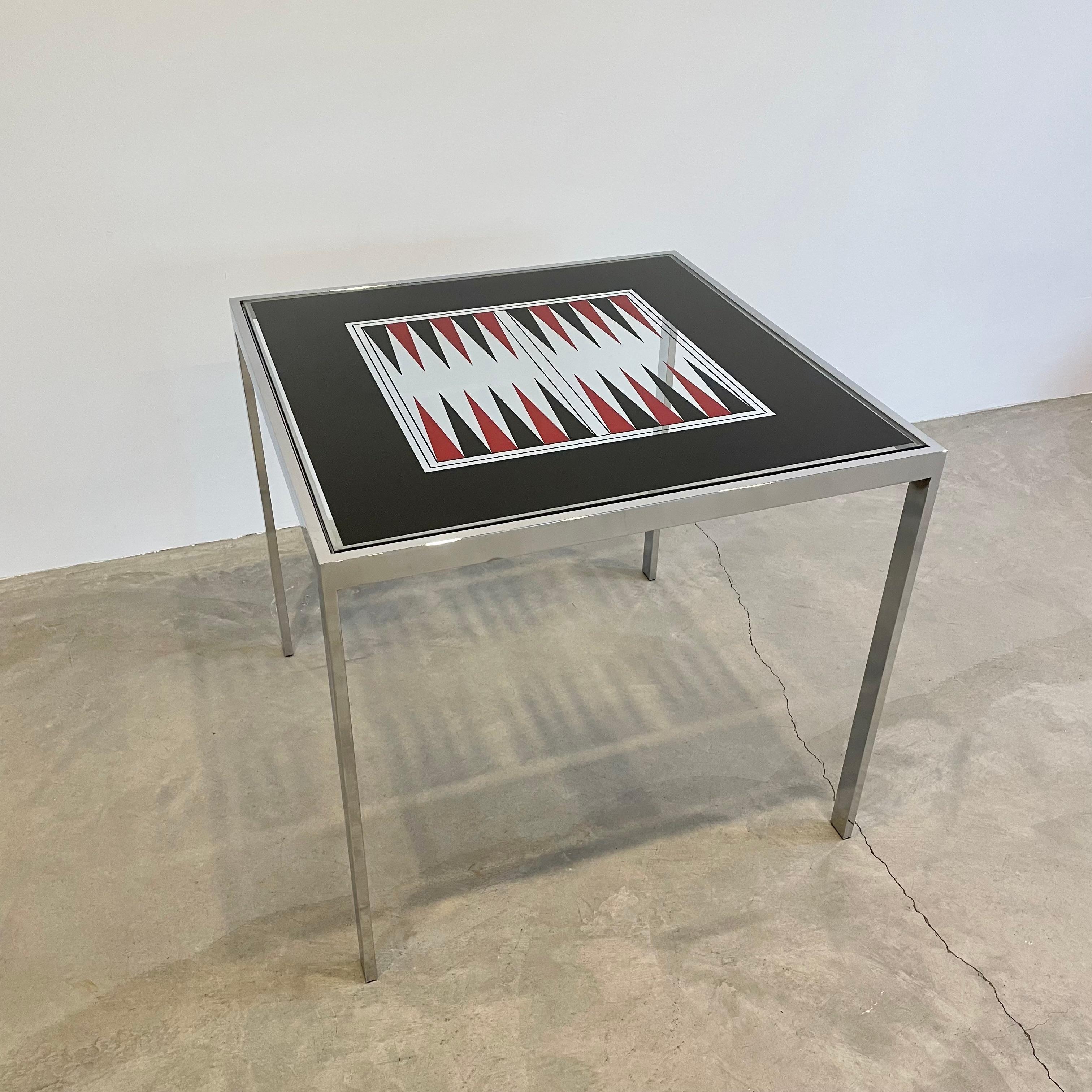 Chic Maison Jansen chromed steel and mirror glass backgammon games table, circa 1975. Sleek, minimalist design exudes immaculate craftsmanship. Gorgeous addition to any home interior or games room which would blend effortlessly within a myriad of