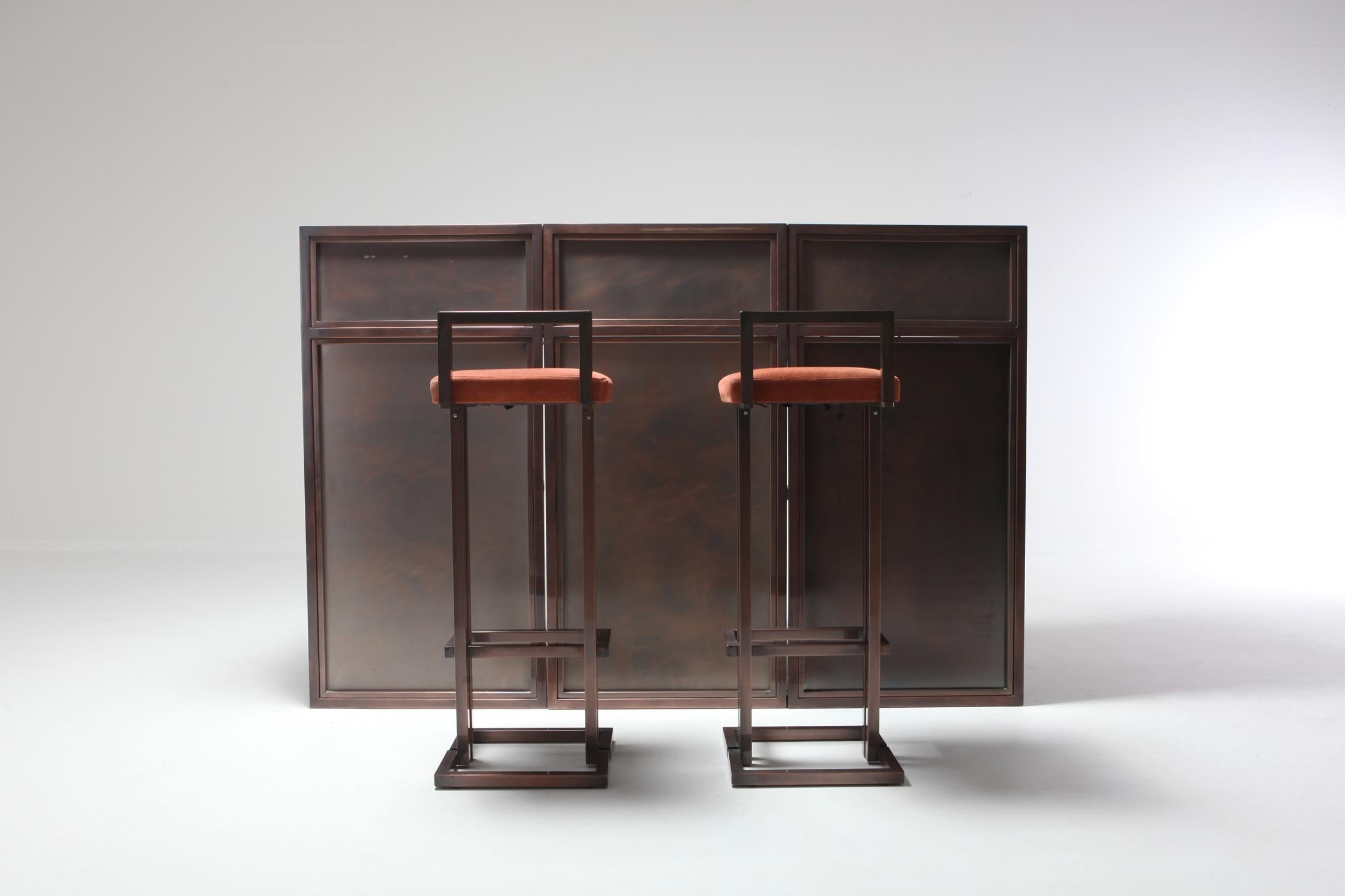 Hollywood Regency bar counter consisting of three modules. 

Bronze patinated panels and frame with interior storage space 
by Maison Jansen, France, 1970s. 

   