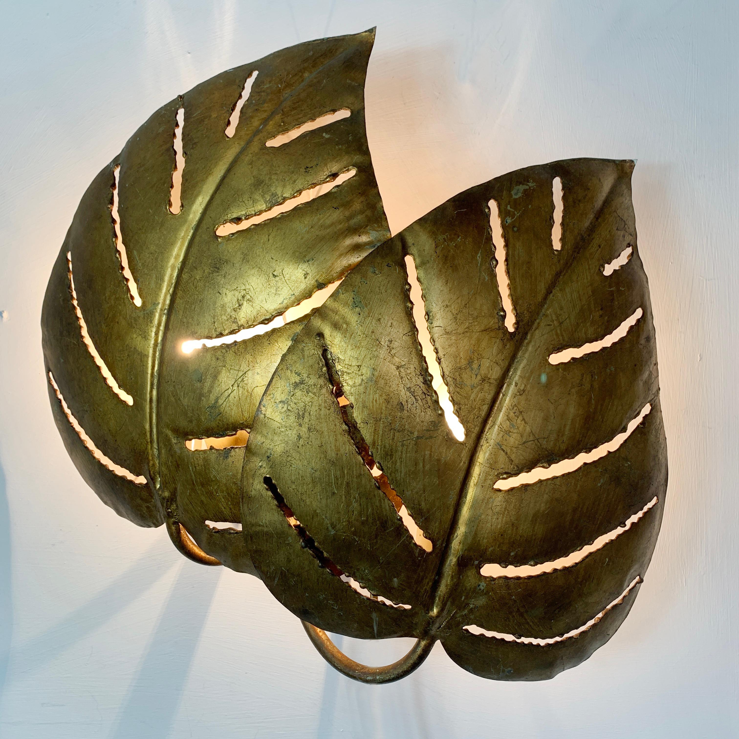 Maison Jansen Monstera double leaf wall lights
Beautiful gilt appliques from the renowned Maison Jansen in Paris

A Brutalist design classic, that brings together the brilliance of the Jansen hand finishing with the French flair for which they are