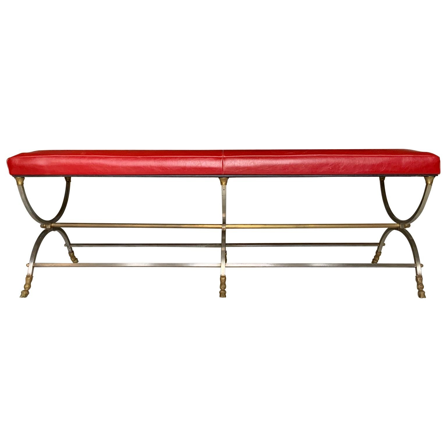 Maison Jansen neoclassical bronze and steel bench in red leather upholstery

A Maison Jansen neoclassical bronze and steel long bench. Great form, hoof feet, and vintage red leather in beautiful condition. Very unusual, original bench form. A real