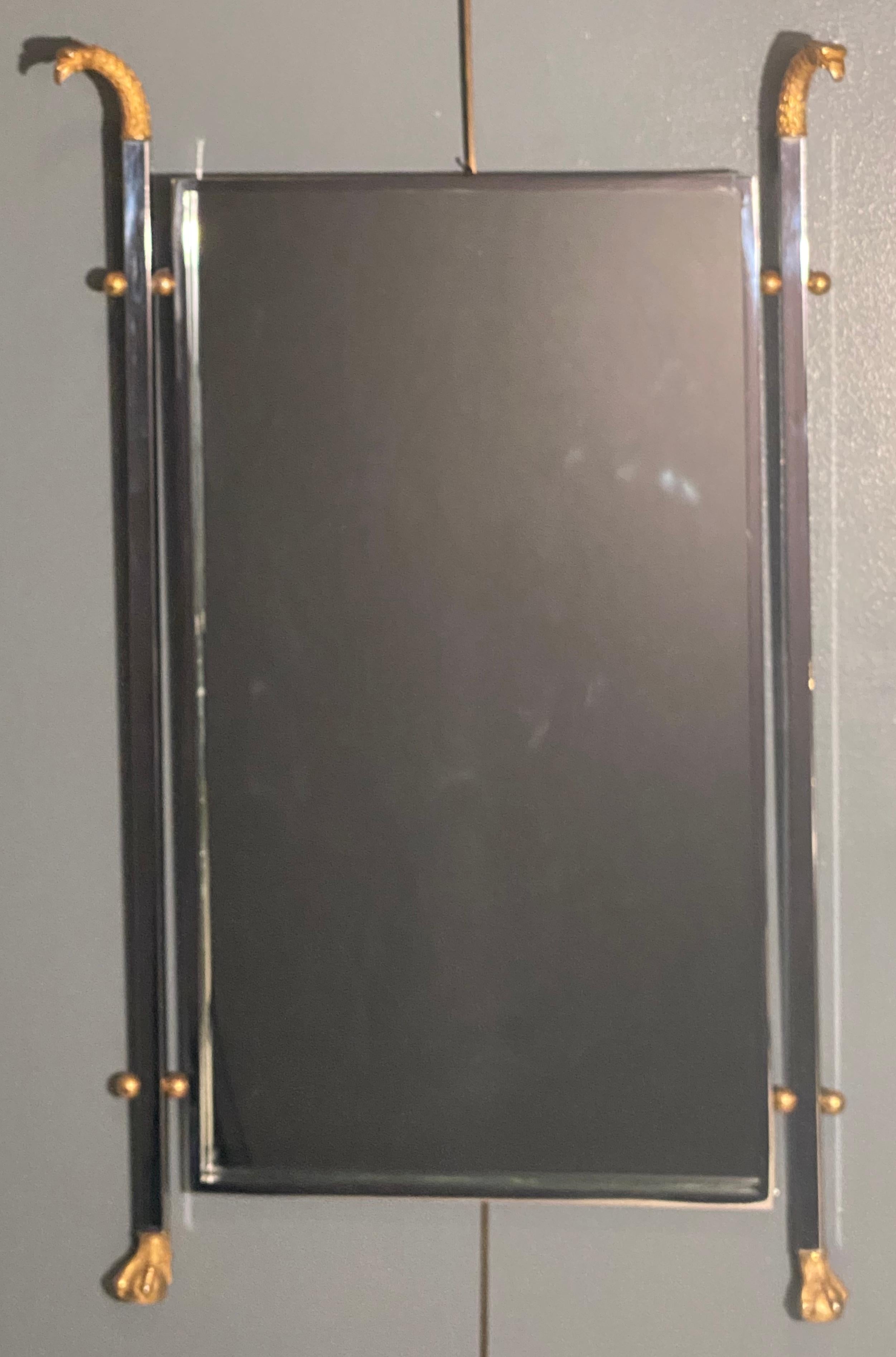 Maison Jansen Neoclassical Eagle Motif Mirror in a Steel and Bronze Finish In Good Condition In Manhasset, NY