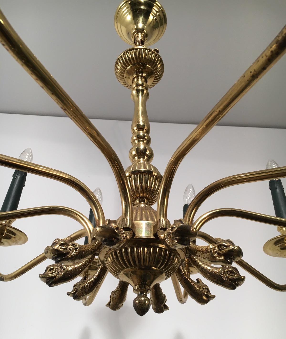 Mid-20th Century Maison Jansen, Neoclassical Style 10-Light Brass Chandelier with Dolfin Heads