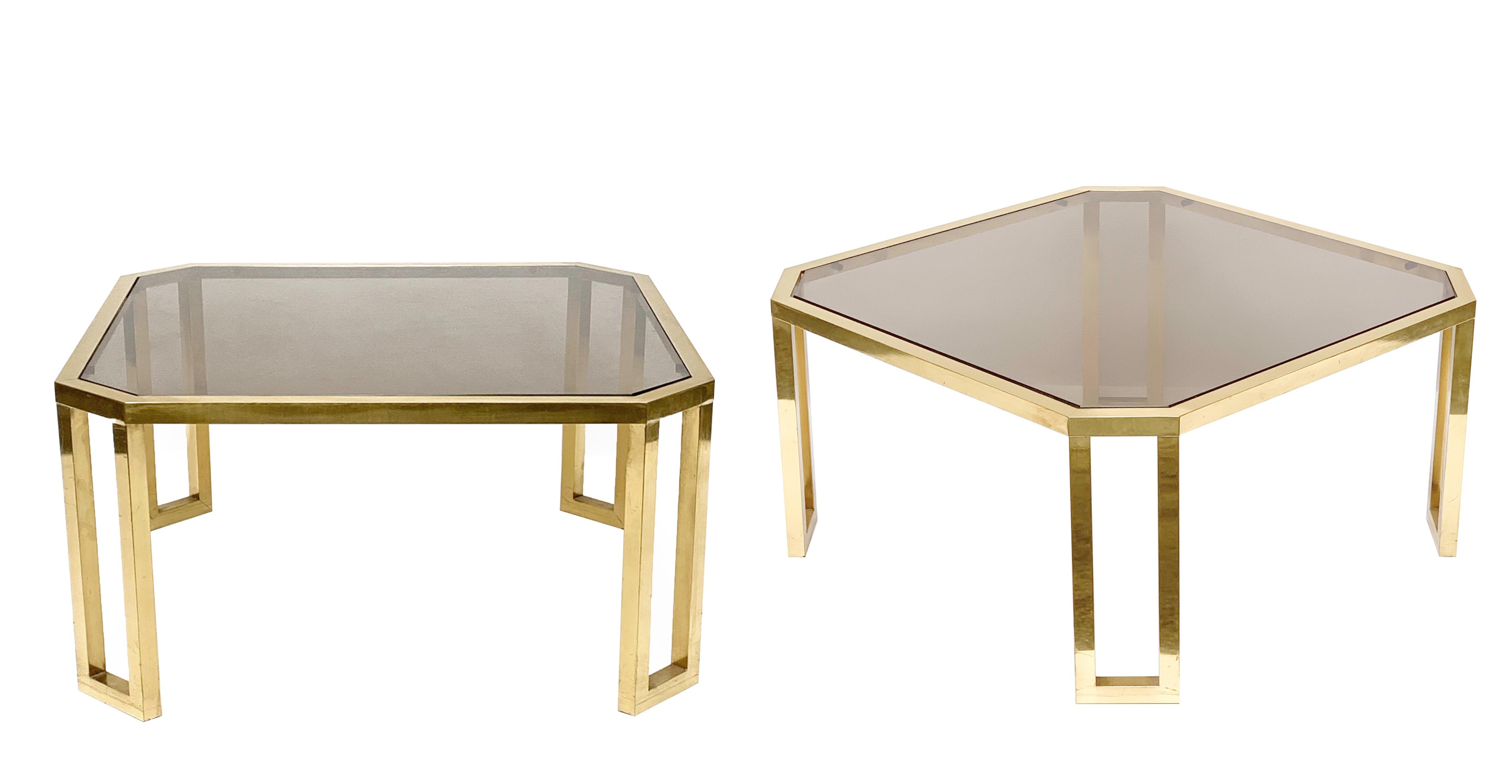 Octagonal coffee table in brass and smoked glass by Maison Jansen.
Can be used as a side table or as a coffee table. France, 1970s

Two pieces available, the price refers to the single table.