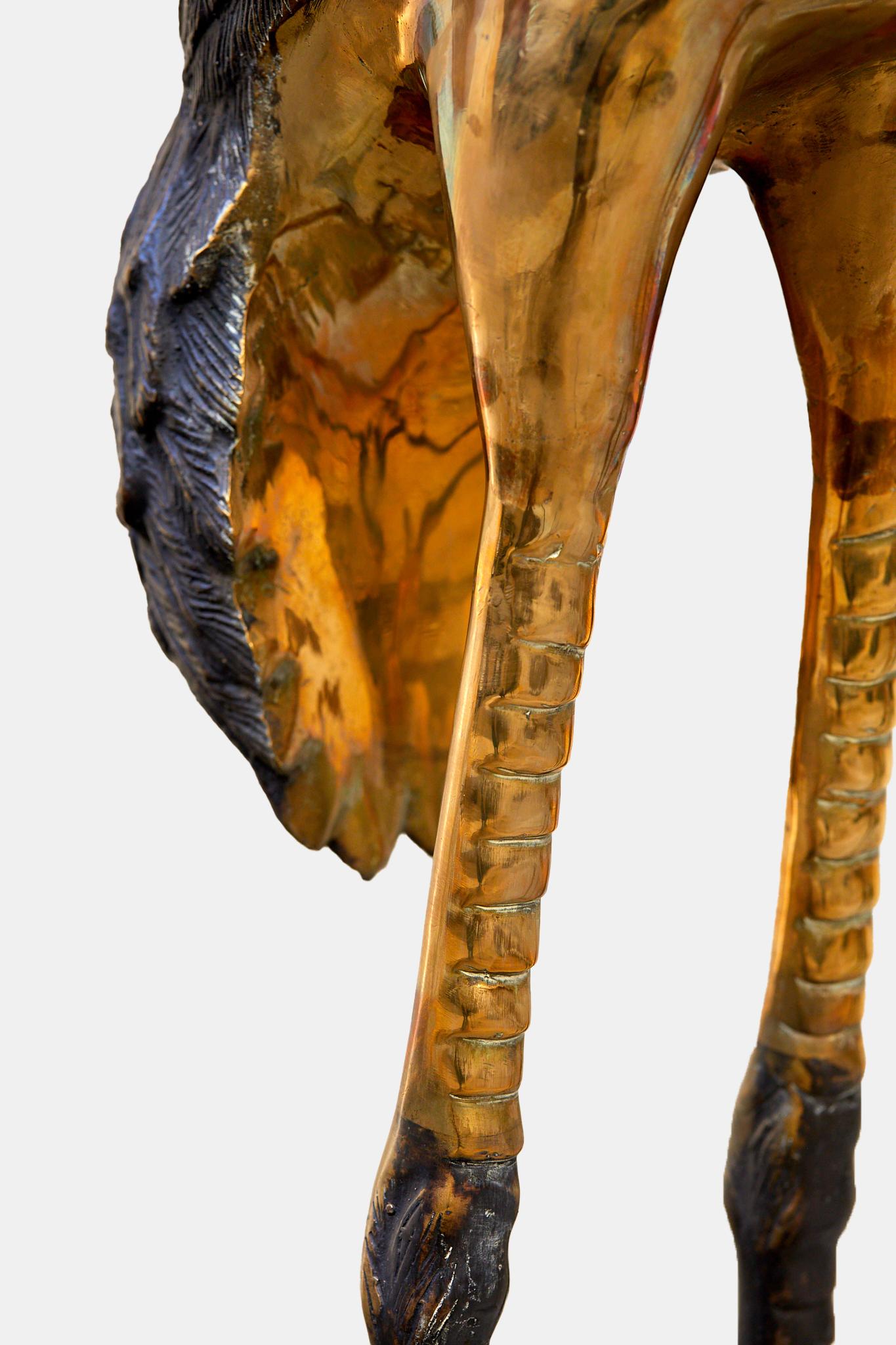 French Maison Jansen, Pair of bronze herons with a double silver and gold patina.