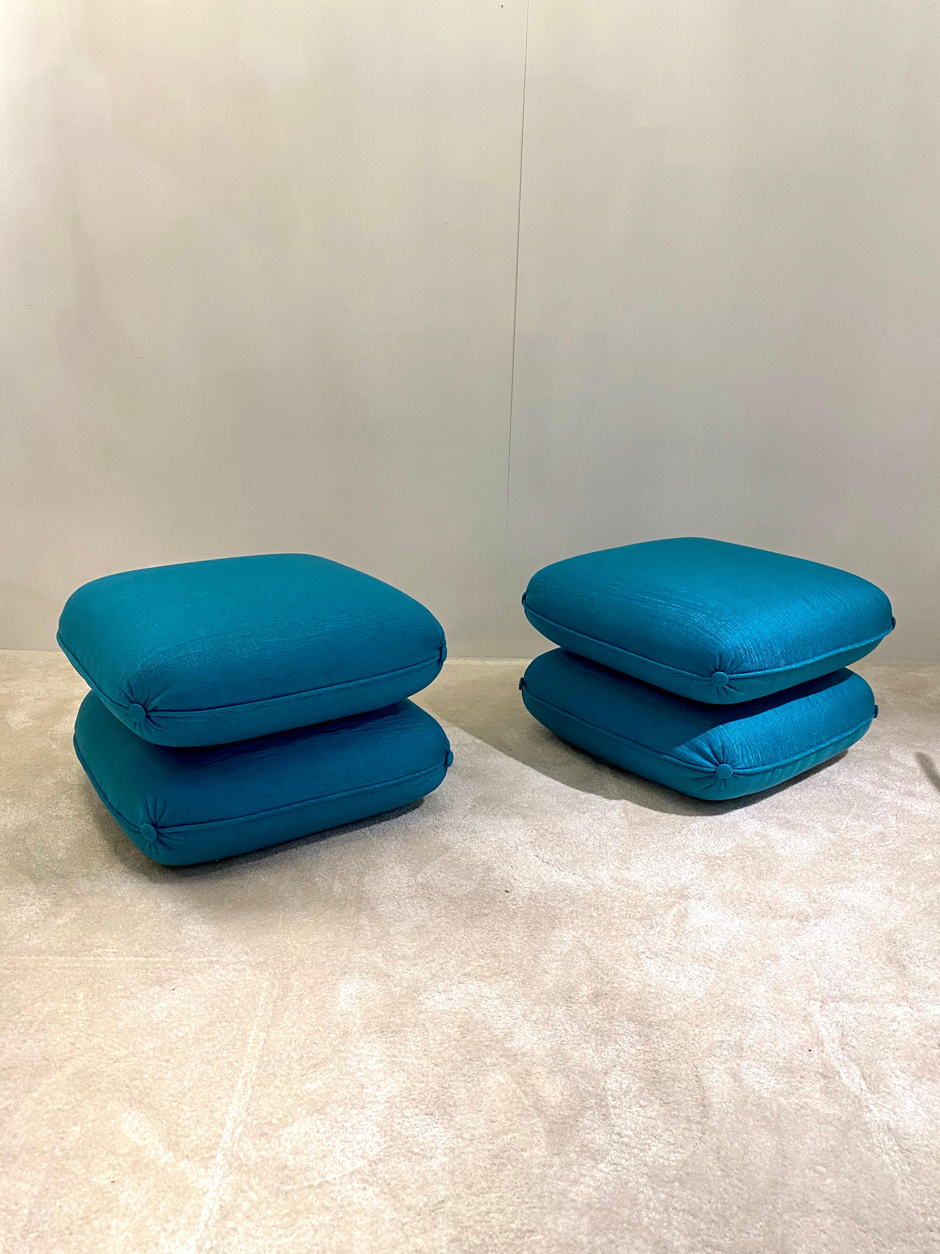 Maison Jansen was well known for his traditional furniture.
From 1970s the French manufacture adjust his taste to be modern and comfy.
These two footstools have been upholstered in a beautiful and strong silk Pierre Frey vibrant turquoise color