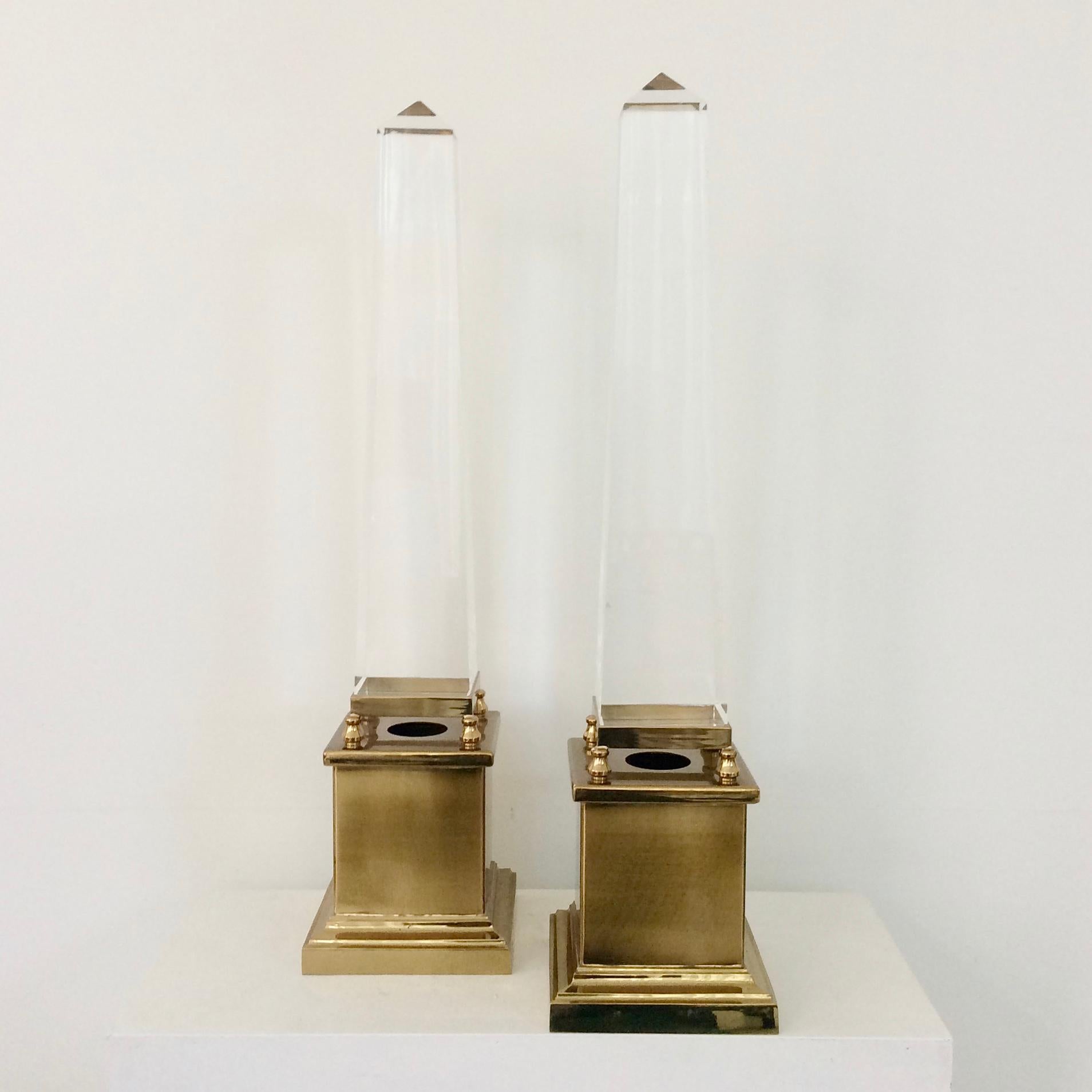 Pair of obelisk table lamps, Maison Jansen, circa 1970, France.
Lucite, brass.
One bulb E14 of 40 W.
Dimensions: 63 cm H, 15 cm W, 15 cm D.
Good original condition.
We ship worldwide

  