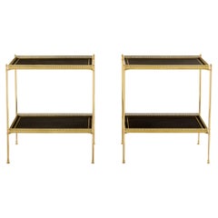 Maison Jansen pair of two-tier side tables brass black leather 1960s