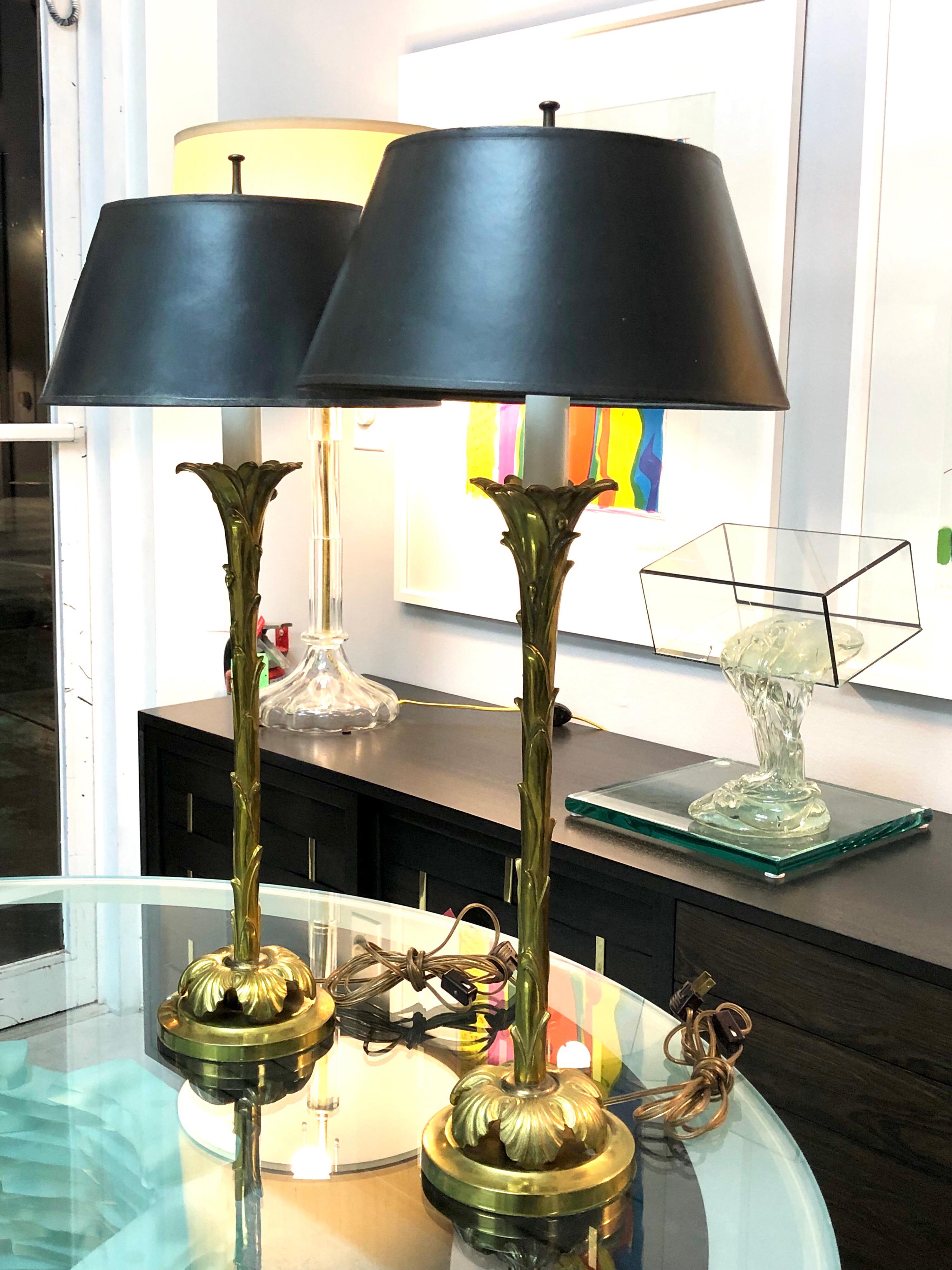 A graceful pair of table lamps. Nice detail. Retain original black shades. 2 light bulbs each. Shades are 8
