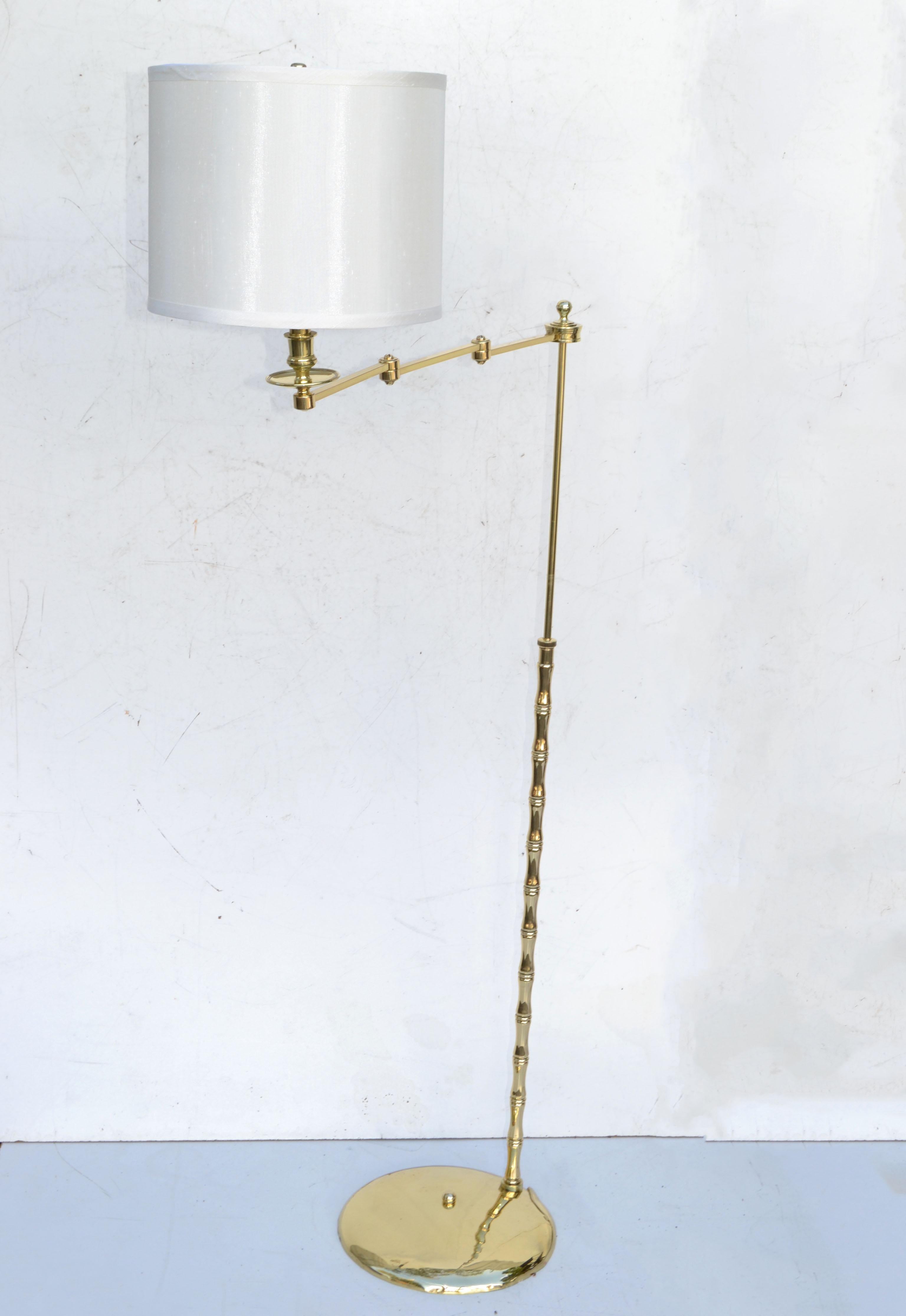 Original French Mid-Century Modern polished bronze & brass retractable floor lamp by Maison Jansen made in France 1960.
Perfect working condition and takes one regular Light bulb.
Sold with custom made beige drum shade.
Measurement Shade: