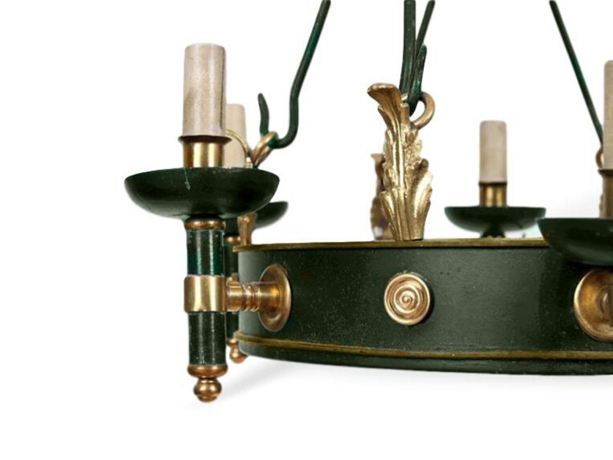 A Maison Jansen Regency style six-arm painted iron and bronze chandelier, circa 1940

Dimensions: Height 30