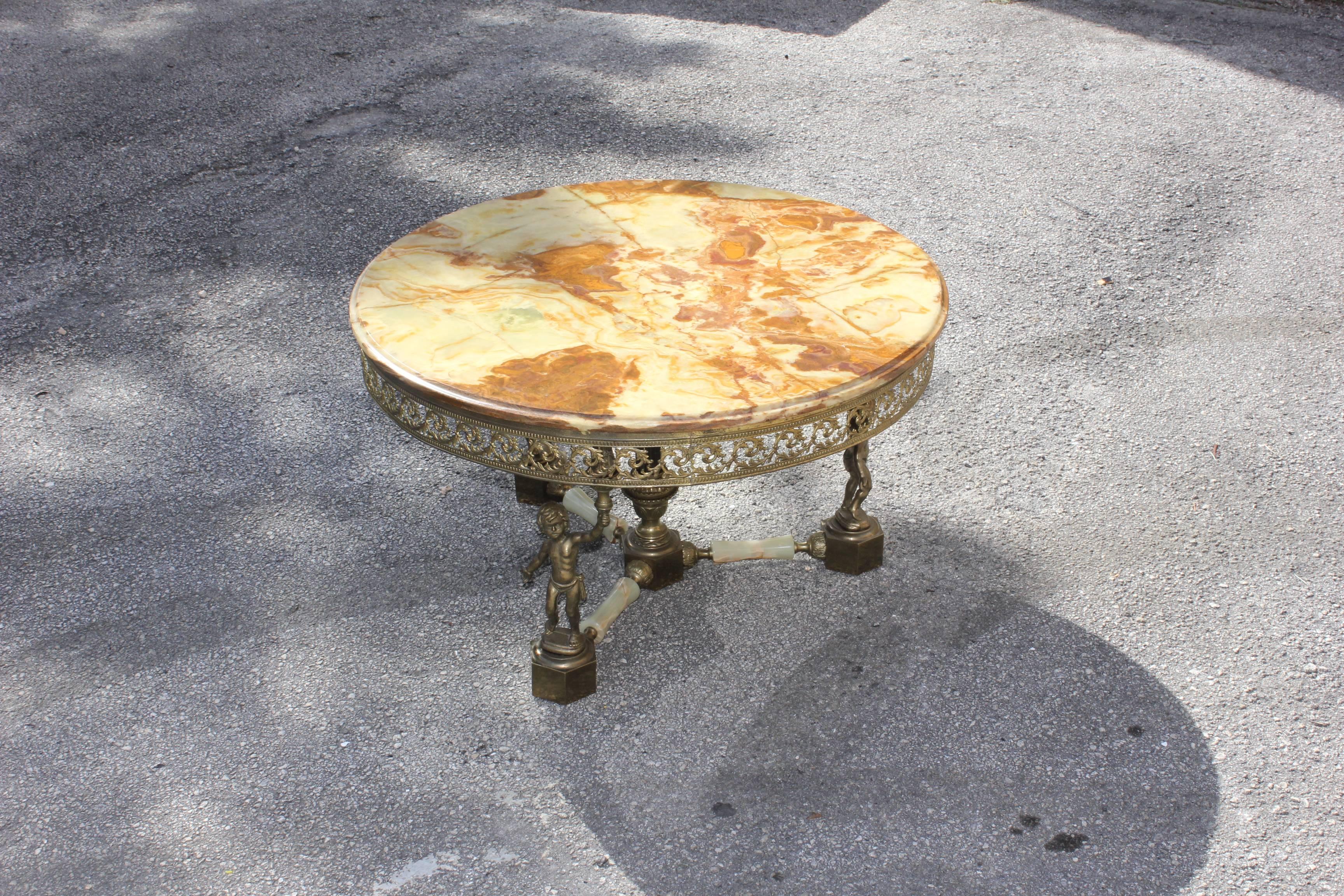 Monumental Maison Jansen round coffee or cocktail table with onyx top and baby base bronze, circa 1940s the onyx are in beautiful color in perfect condition the table are in solid bronze.