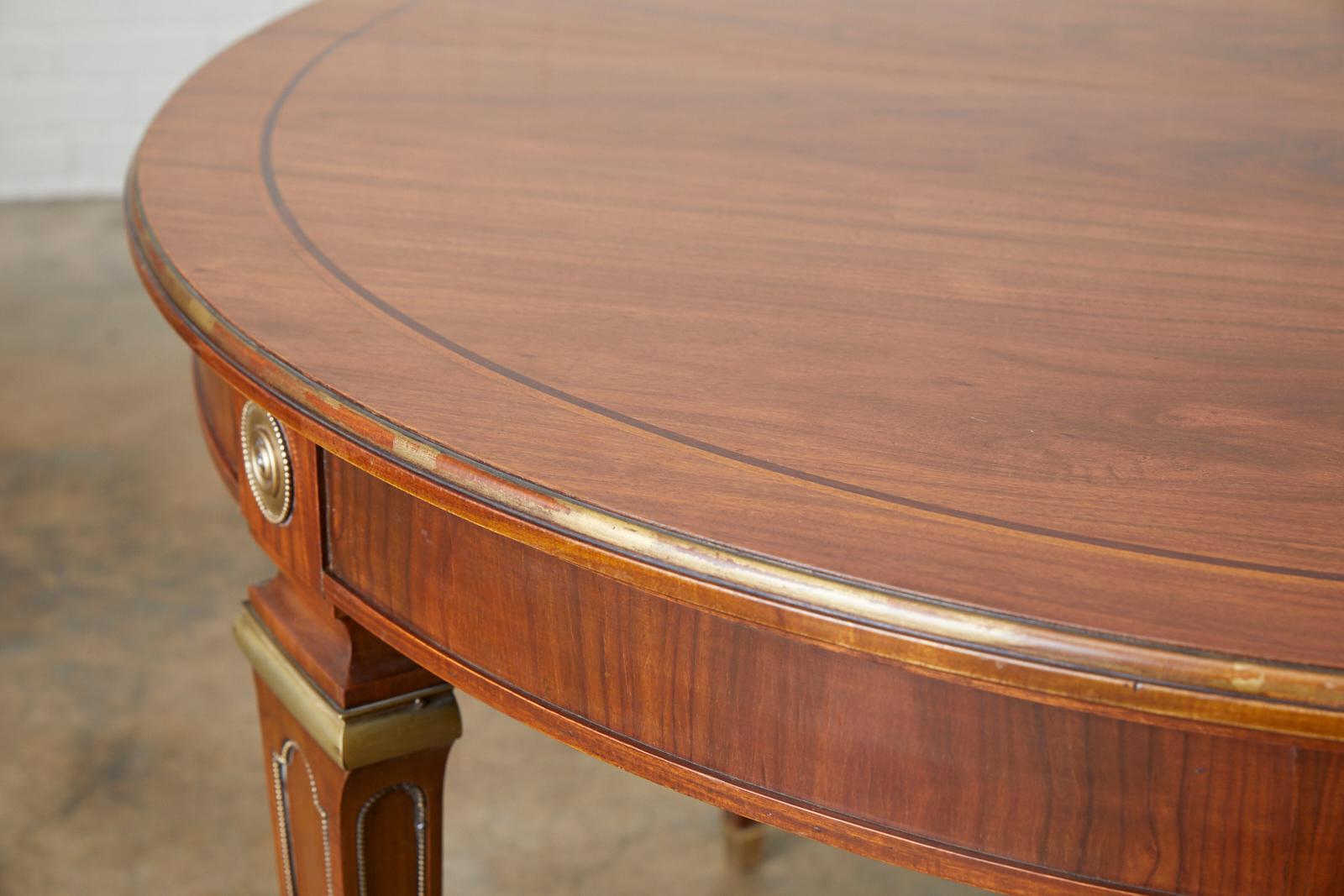 20th Century Maison Jansen Round Mahogany Dining Table with Leaf