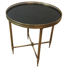 Maison Jansen, Round Neoclassical Style Brass Side Table with Black Top, French