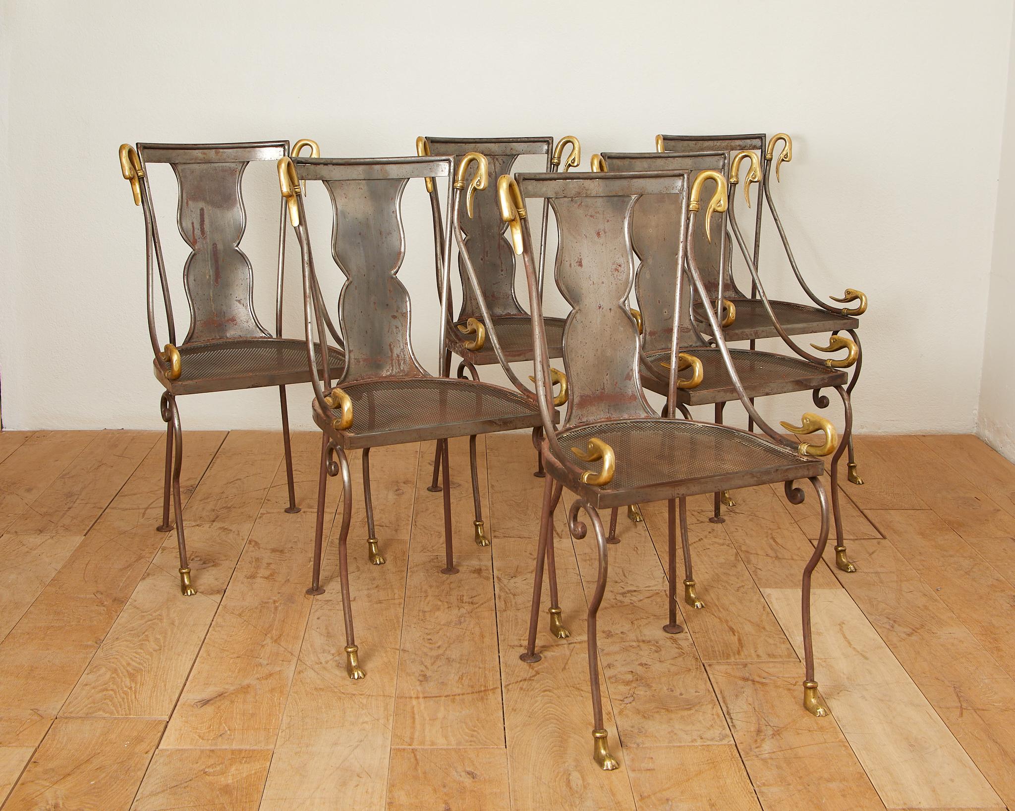Maison Jansen, Rue Royale,
set of six swan-neck chairs,
sheet iron and bronze, seat cushions to be reupholstered,
good general condition,
circa 1960, France.
Height 88 cm, width 45 cm, seat height 42 cm.
