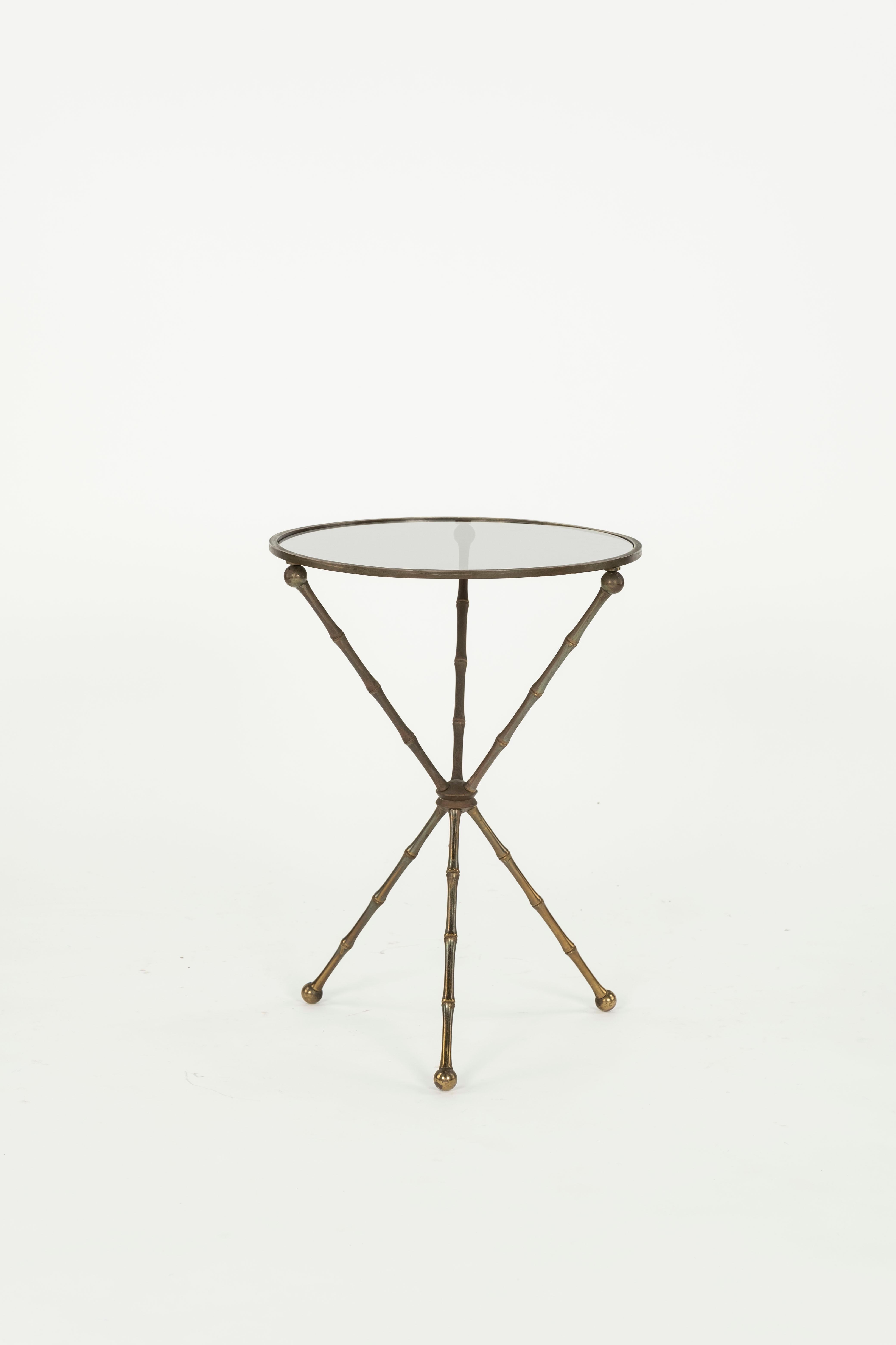 Glass top with faux bamboo brass legs martini side table.