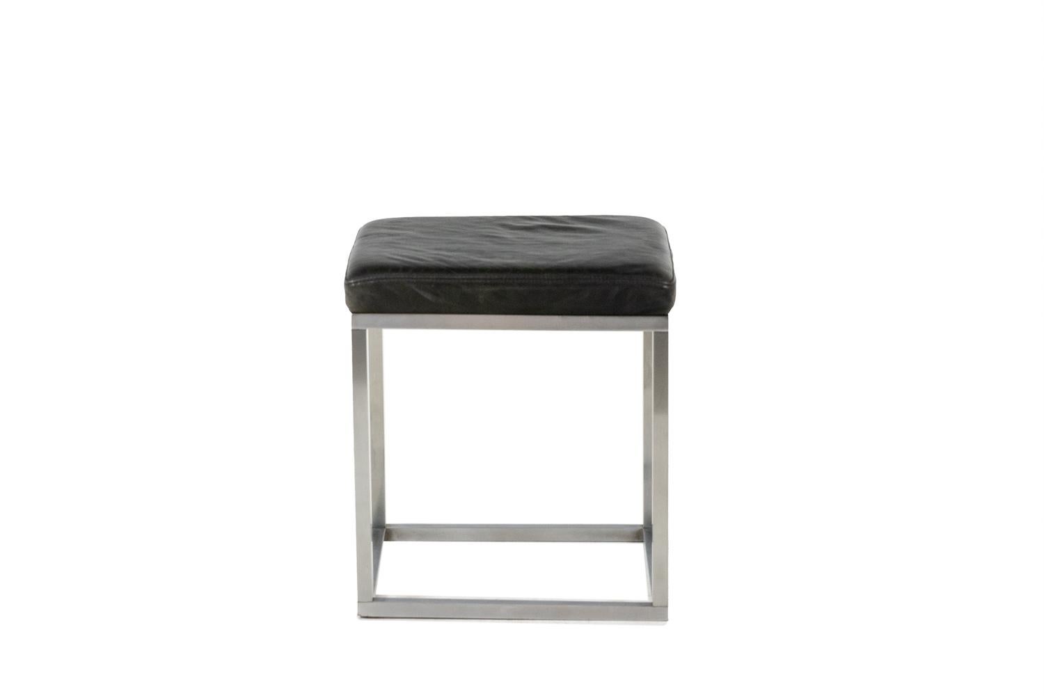 20th Century Maison Jansen. Stool in brushed aluminum and black leather. 1970s. For Sale