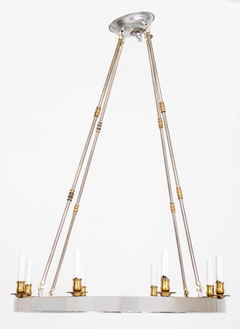Maison Jansen Style Modern chrome chandelier with ring body supporting eight lights with brass bobeches. 

Dealer: S138XX