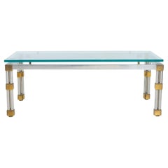 Mesa baja cromada con tapa de cristal estilo Maison Jansen