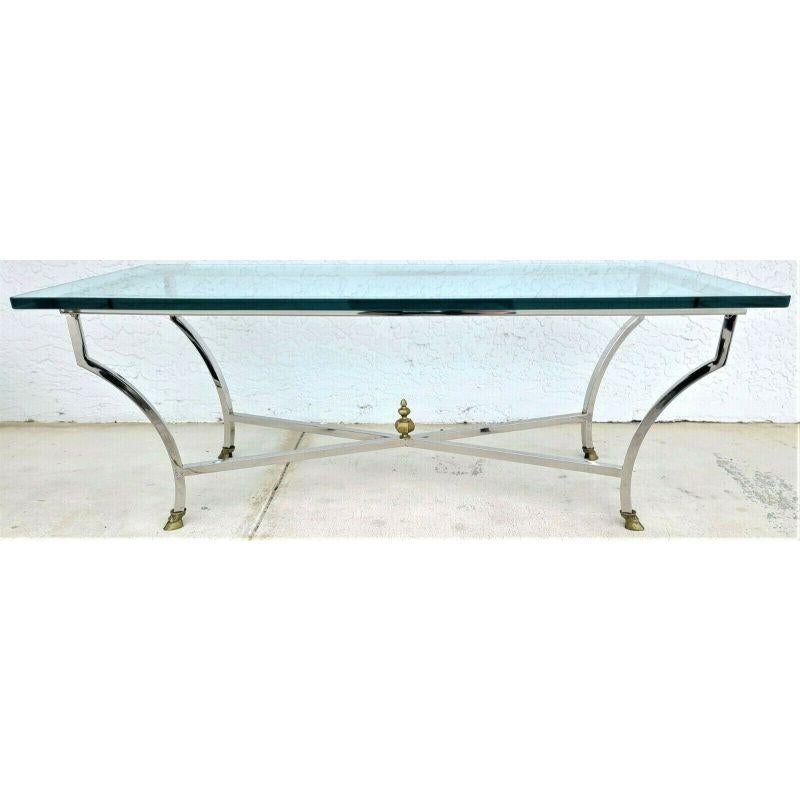 For FULL item description click on CONTINUE READING at the bottom of this page.

Offering One Of Our Recent Palm Beach Estate Fine Furniture Acquisitions Of A 
Maison Jansen Style Mid Century Italian Modern Chrome & Glass Coffee Table with Brass
