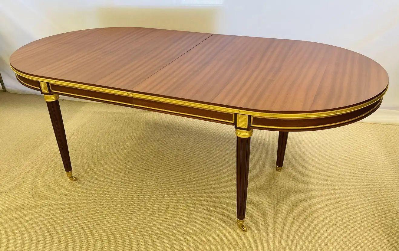 Maison Jansen Inspired mahogany dining table, conference table that sits over 15 feet long, Louis XVI Style

Part of our extensive collection of over forty dining tables and chair sets as seen on this marketplace. This monumental, fully refinished