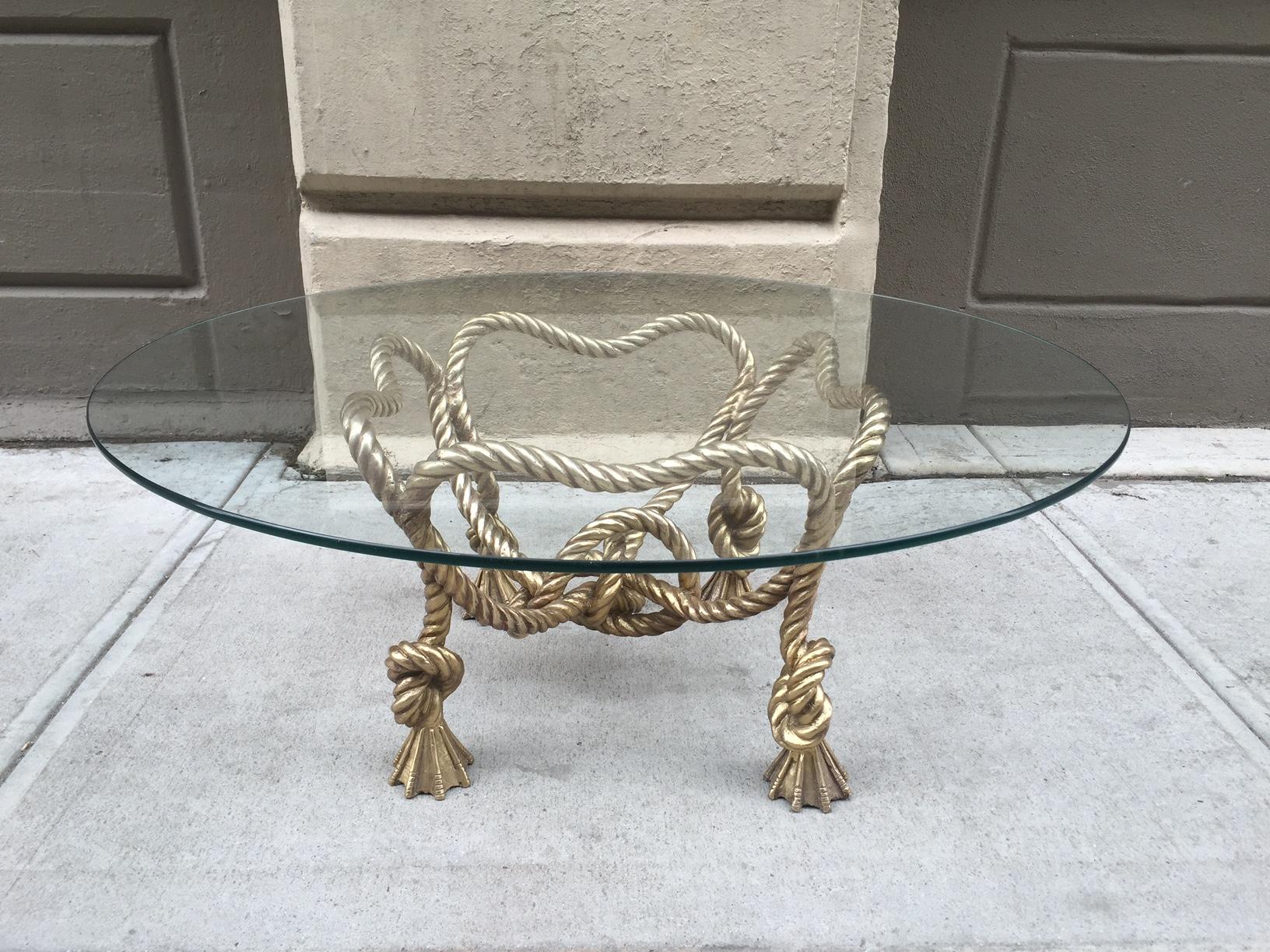 Beautiful solid bronze stylized rope base with a glass top. Manner of Maison Jansen.