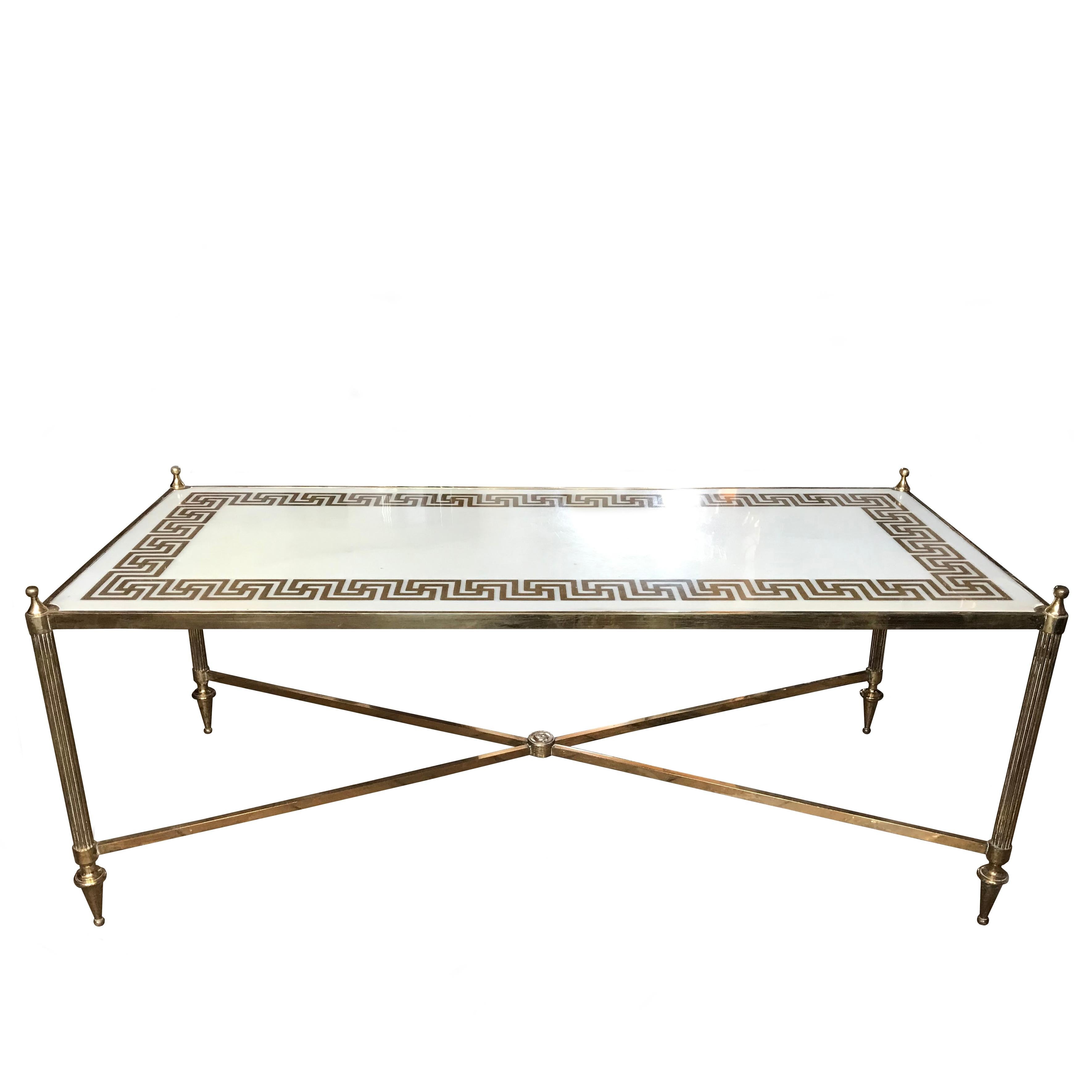 Maison Jansen style gilded bronze and marble table. Chic and super quality with a stylish Greek Key design.