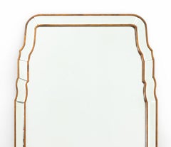 Specchio con taglio a cuscino in metallo dorato in stile Maison Jansen