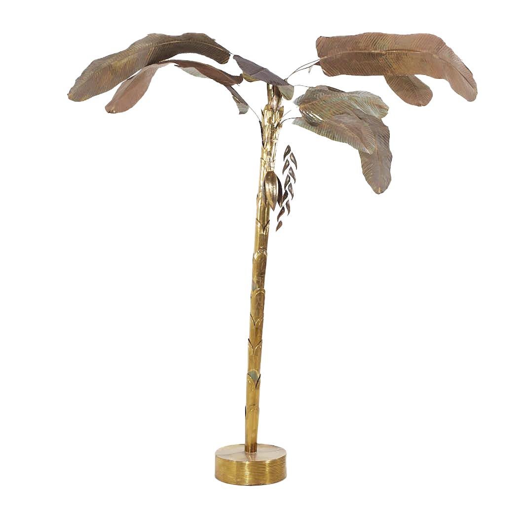 Maison Jansen Style Mid Century Brass Palm Tree

The approximate measurements of the tree are: 96 wide x 96 deep x 99 inches high

We take our photos in a controlled lighting studio to show as much detail as possible. We do not photoshop out