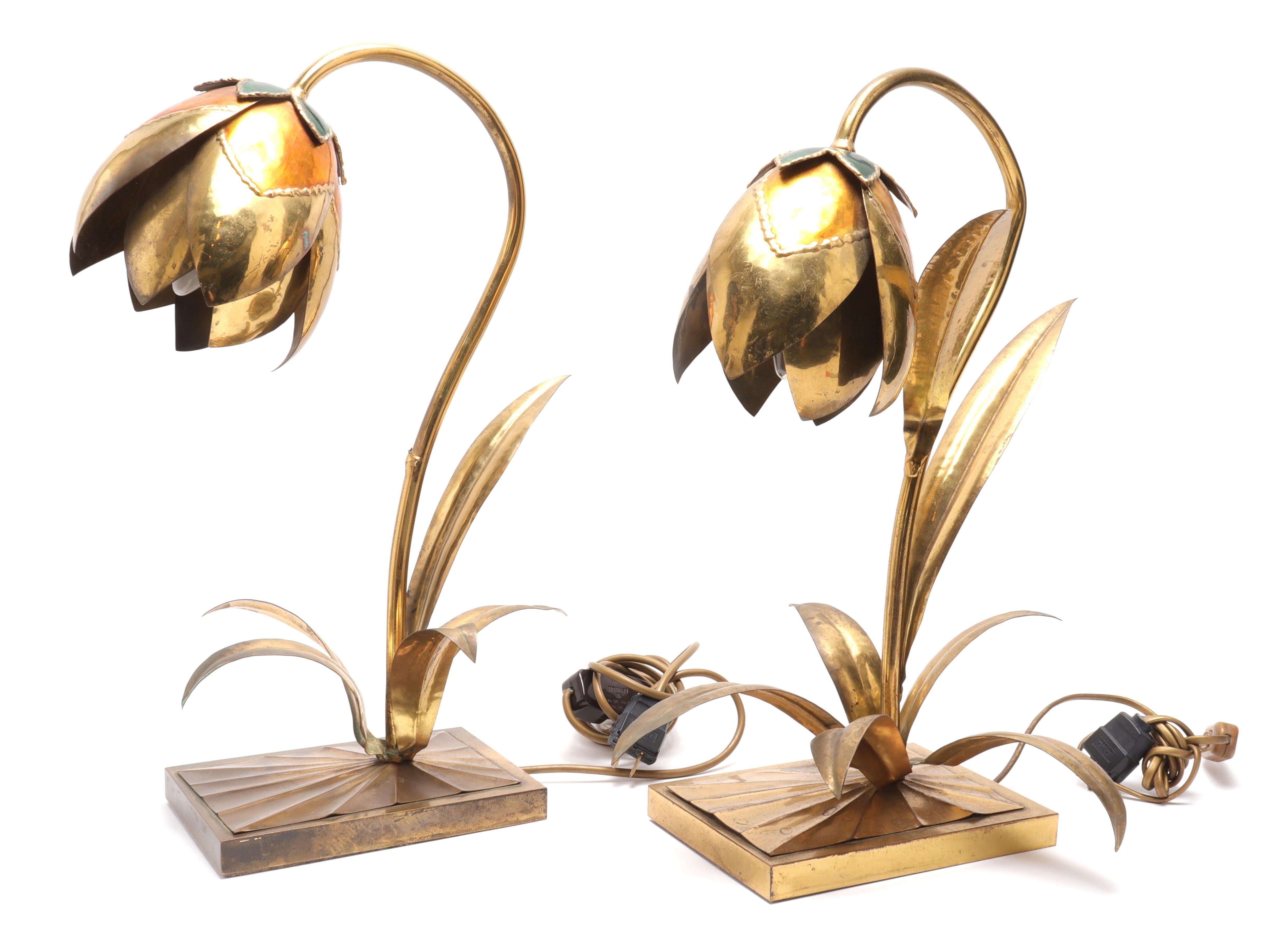 Pair of Maison Jansen style Mid-Century Modern brass and enamel table lamps, in flower form with curving stem, leaves, and rectangular bases. Size: Approximate 18.5