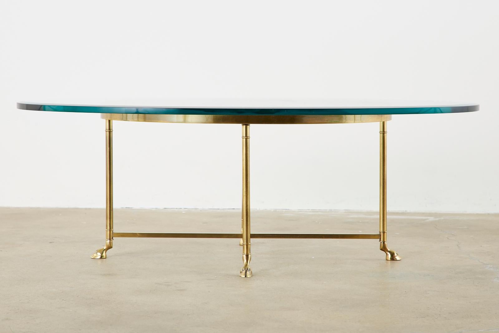 Hollywood Regency Maison Jansen Style Oval Brass and Glass Cocktail Table