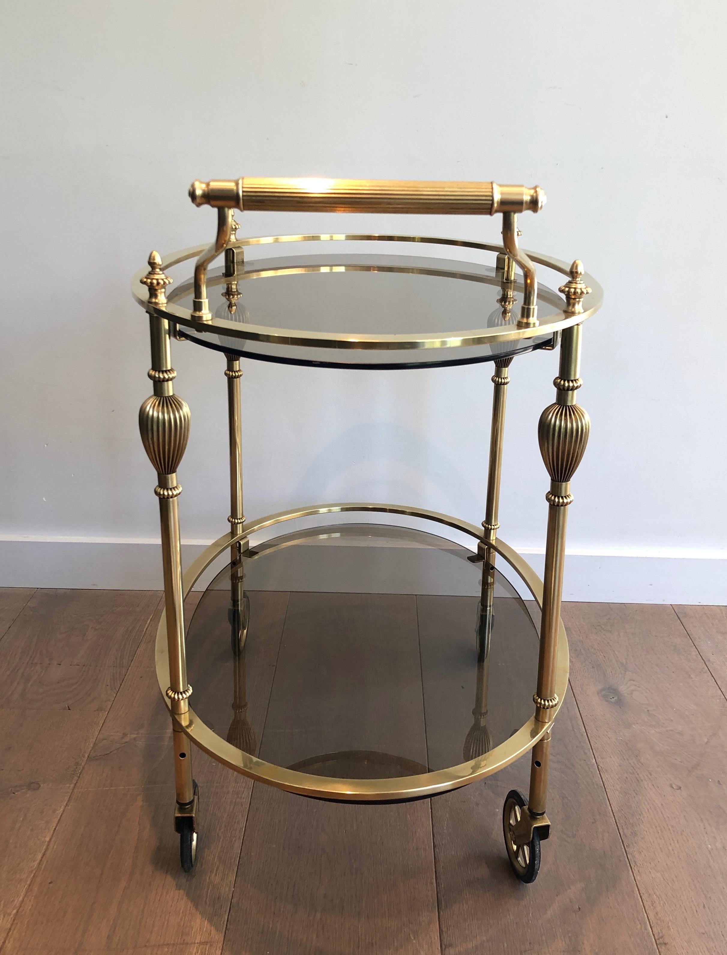 Maison Jansen Style Ovale Brass Bar Cart with Smoked Glass Shelves For Sale 3