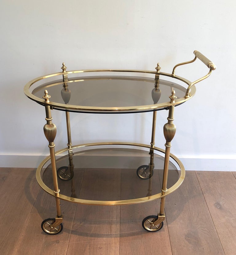 Maison Jansen Style Ovale Brass Bar Cart with Smoked Glass Shelves For Sale 5
