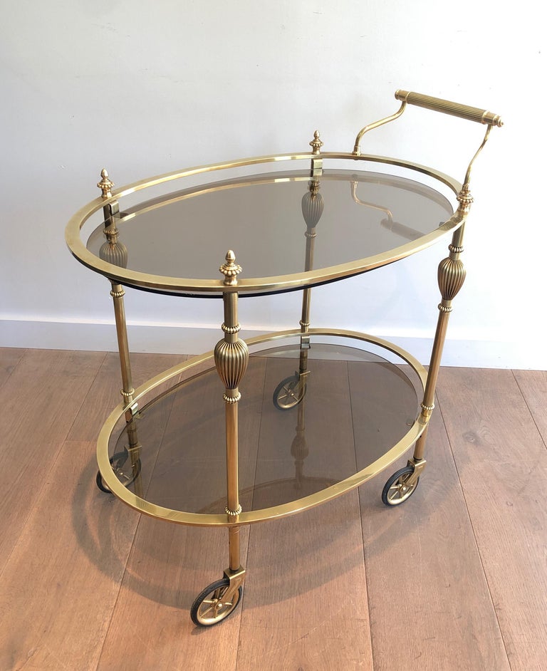 Maison Jansen Style Ovale Brass Bar Cart with Smoked Glass Shelves For Sale 6