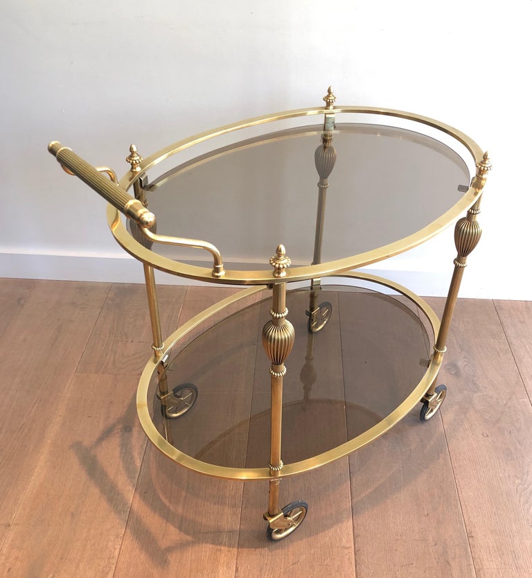 Maison Jansen Style Ovale Brass Bar Cart with Smoked Glass Shelves For Sale 7