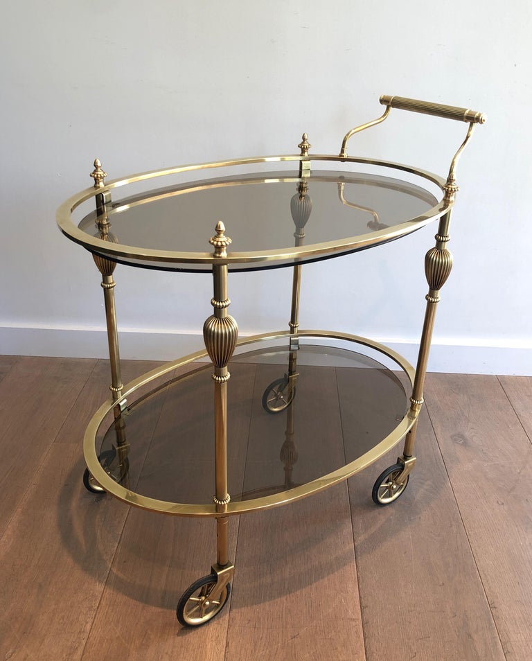 Maison Jansen Style Ovale Brass Bar Cart with Smoked Glass Shelves For Sale 11