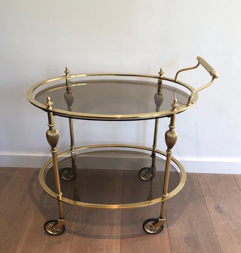 Maison Jansen Style Ovale Brass Bar Cart with Smoked Glass Shelves For Sale 13