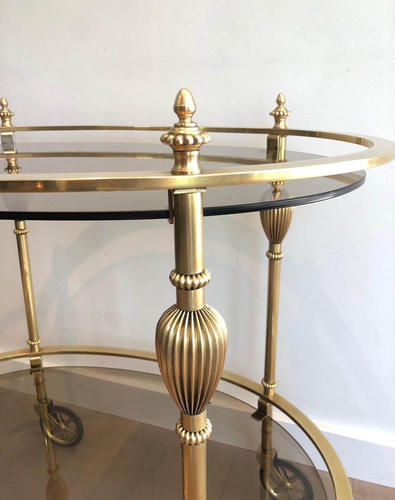 Maison Jansen Style Ovale Brass Bar Cart with Smoked Glass Shelves In Good Condition For Sale In Marcq-en-Baroeul, FR