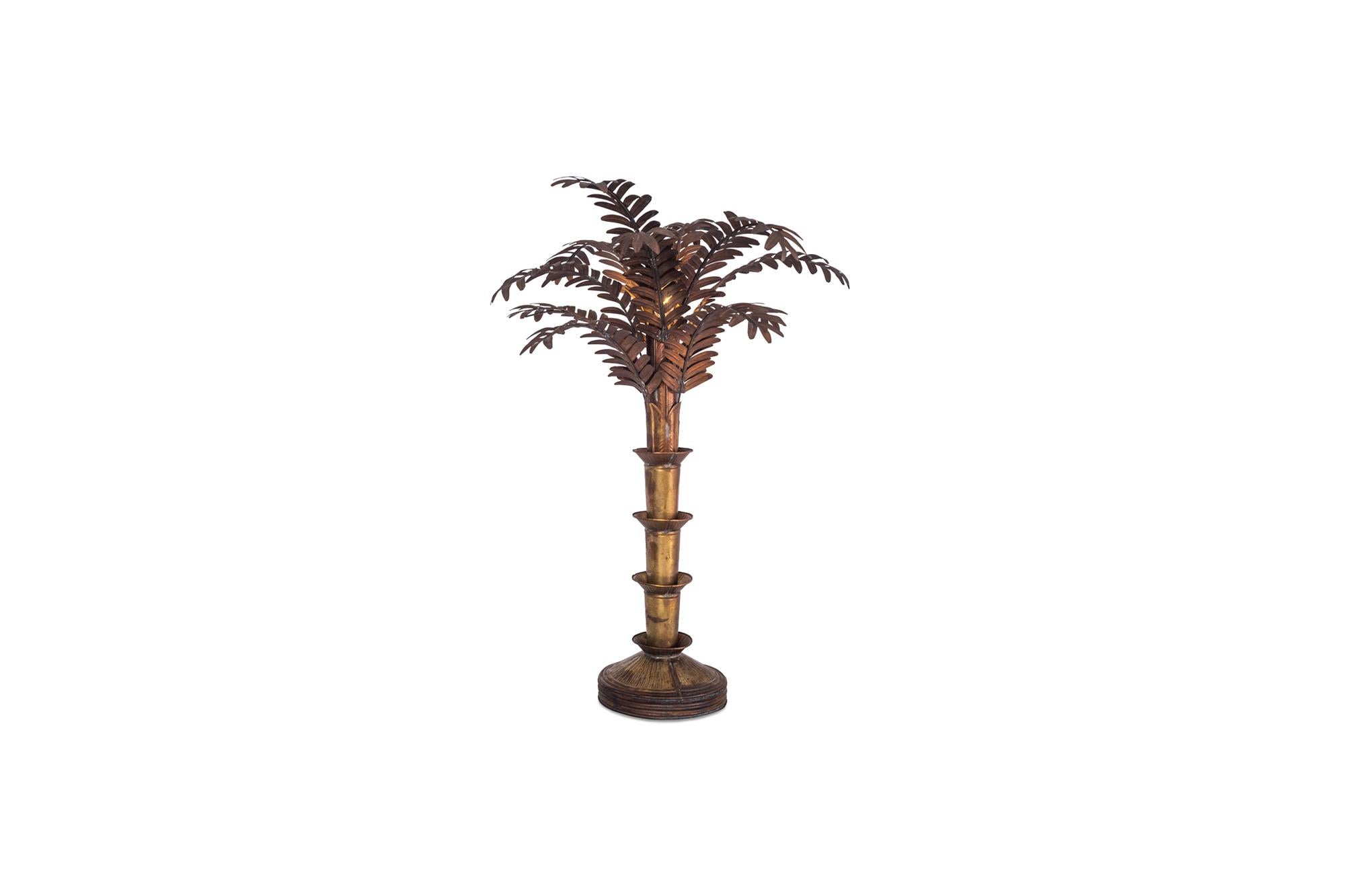 Hollywood Regency table lamp in the style of Maison Jansen. This elegant table lamp consists out of a well-crafted decorative copper stem with base and several removals branches, with handcrafted copper leafs. The complete lamp shows a light,