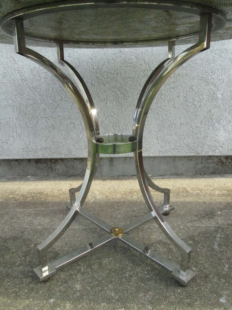 Maison Jansen style steel and brass marble-top center table. 
Would be nice for a breakfast table. 