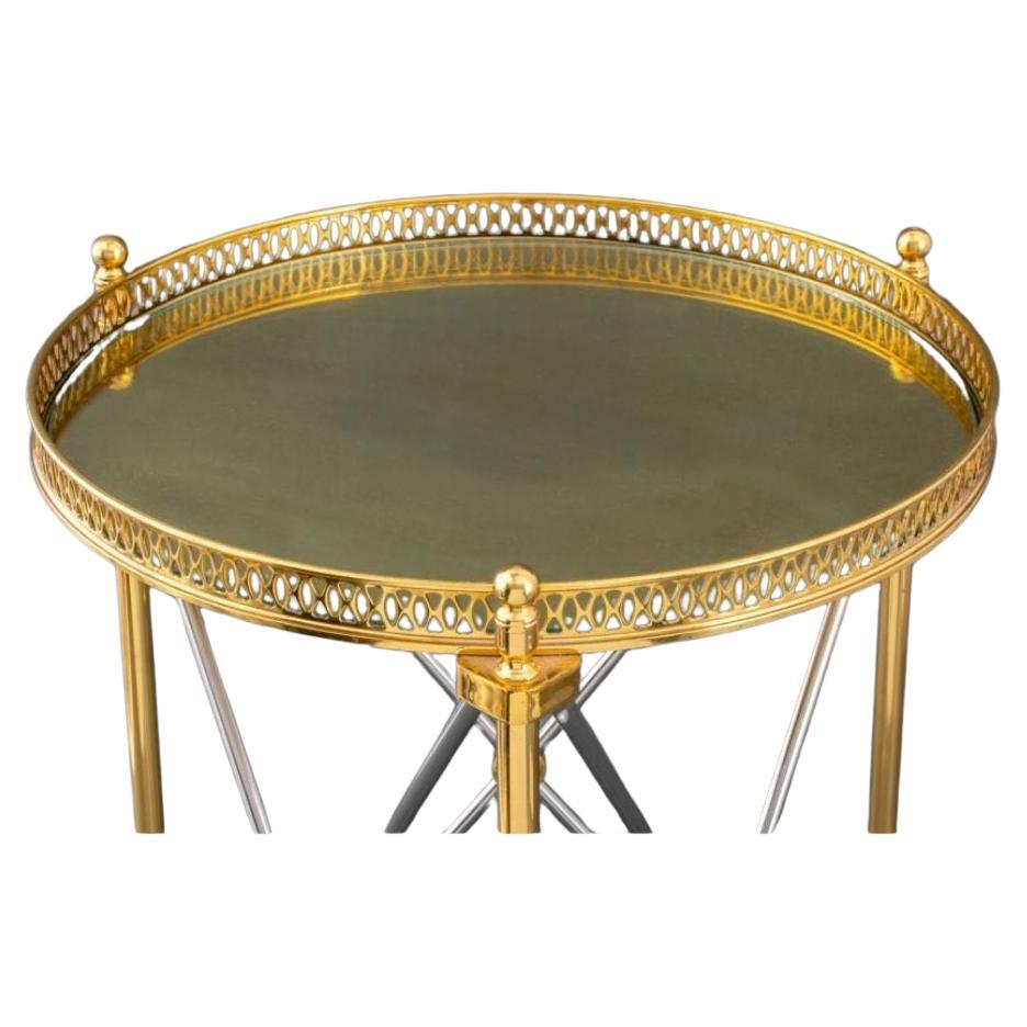 Empire Tables d'appoint en acier poli et laiton à plateau de verre galbé de la Maison Jansen en vente