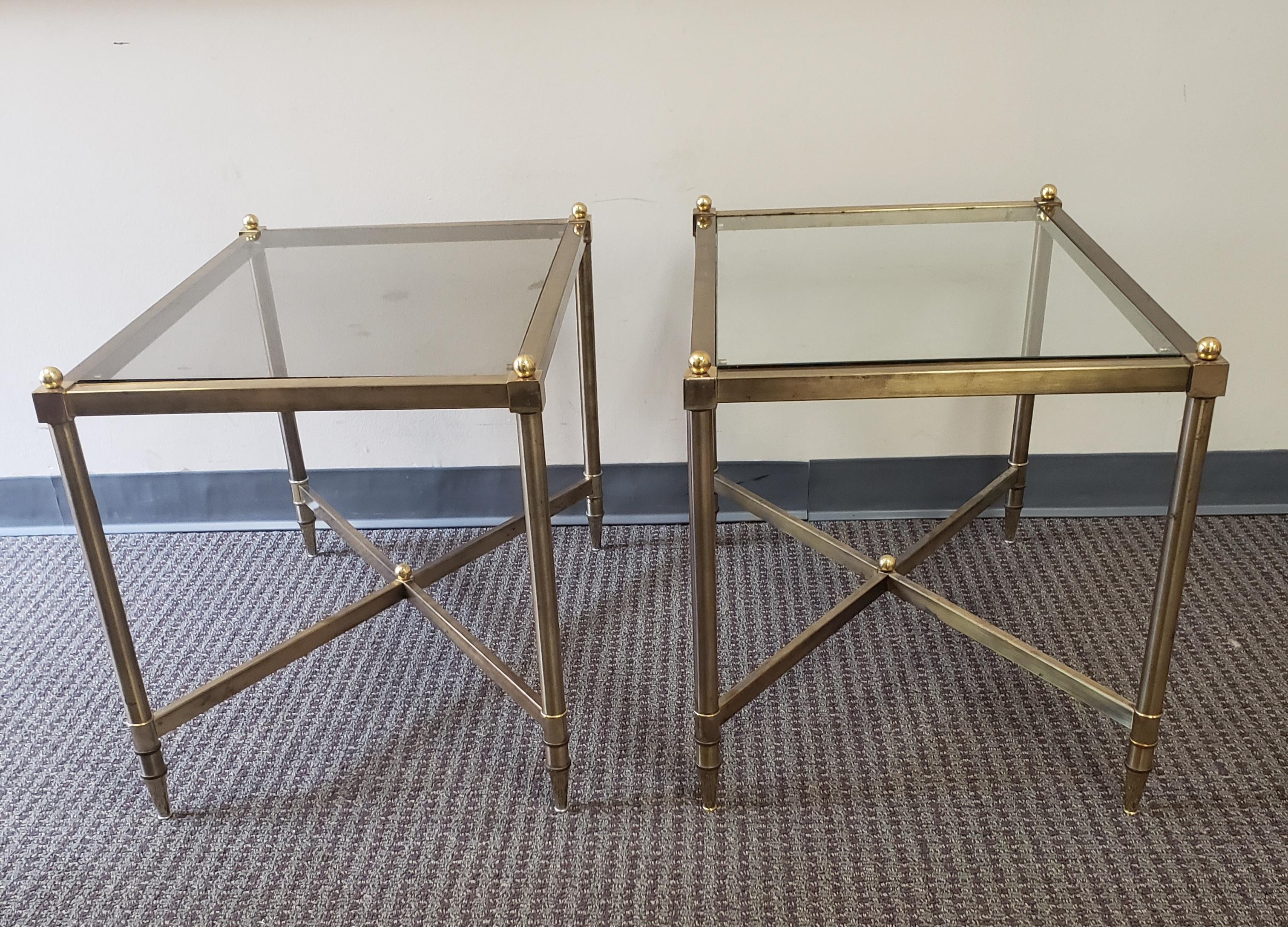 Maison Jansen Style Rectangular Brass and Glass Top Stretcher Base Side Tables. 
Measures 19.25