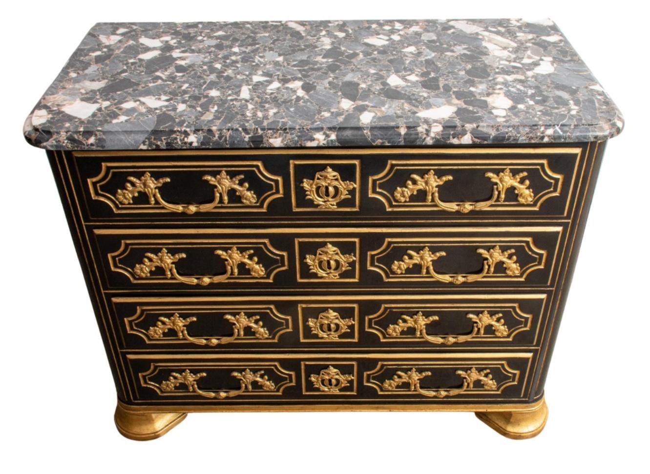 Regence style parcel gilt and ebonized four drawer commode, in the manner of the Maison Janse. This commode features a Breche marble top in black, grey and white, and gilt bronze pulls. Stamped (illegible) to upper right drawer 