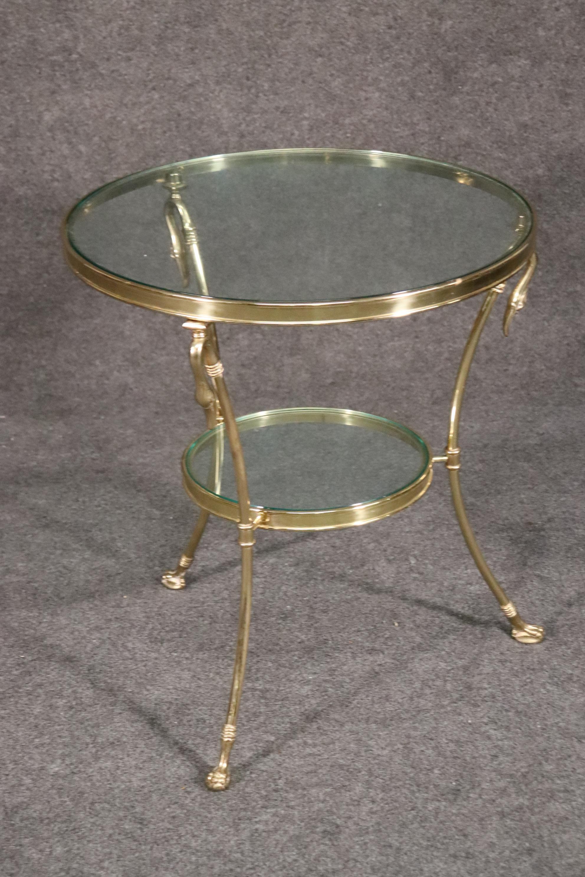 This is a beautiful swan form solid brass gueridon or end table. I have only one table. The table measures 24 x 24 wide x 28 tall.