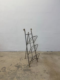 Maison Jansen Style Steel and Brass Rams Head and Feet Magazine Rack, Italy