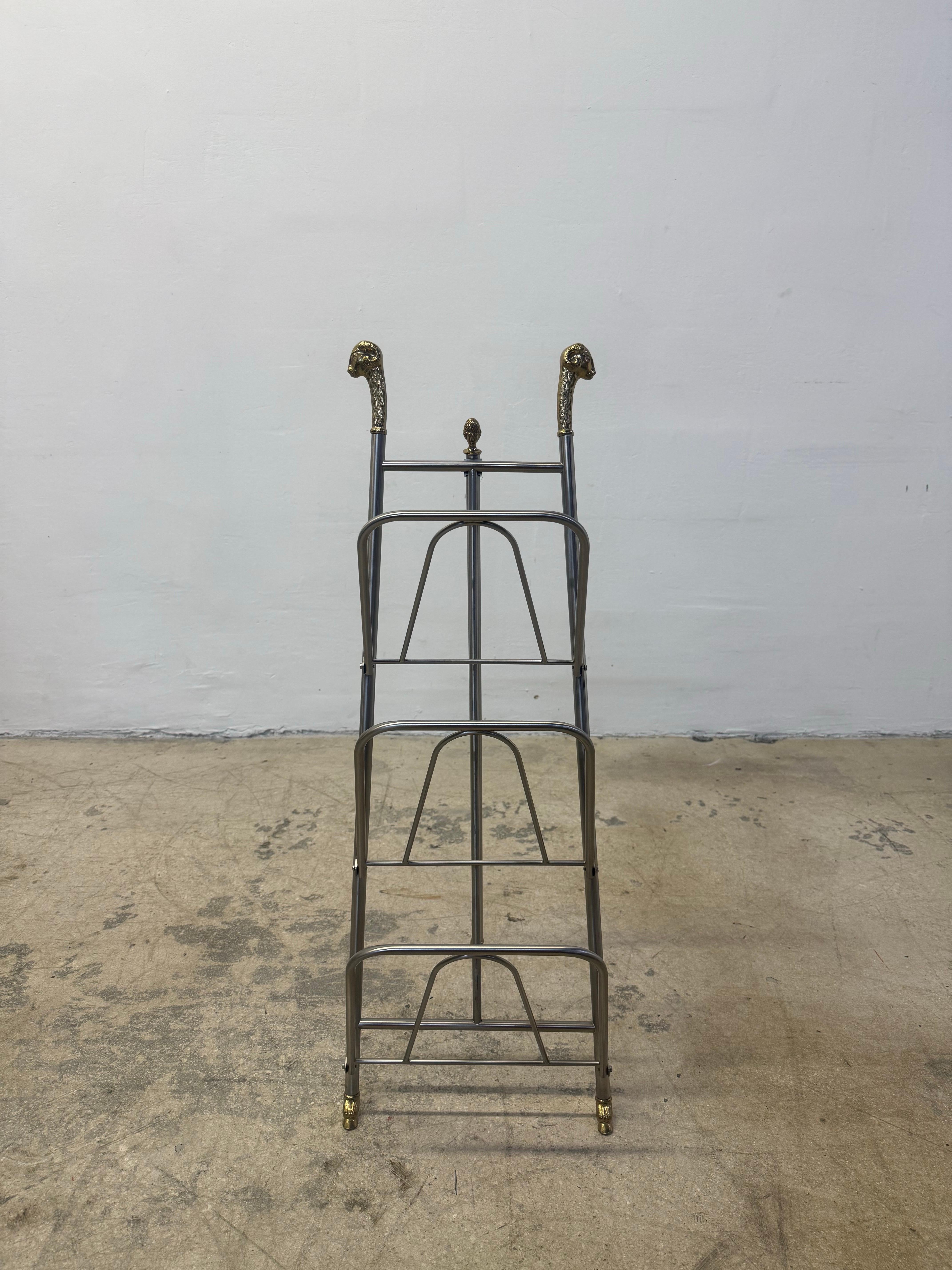 Italian Maison Jansen Style Steel and Brass Rams Head and Feet Magazine Rack, Italy For Sale
